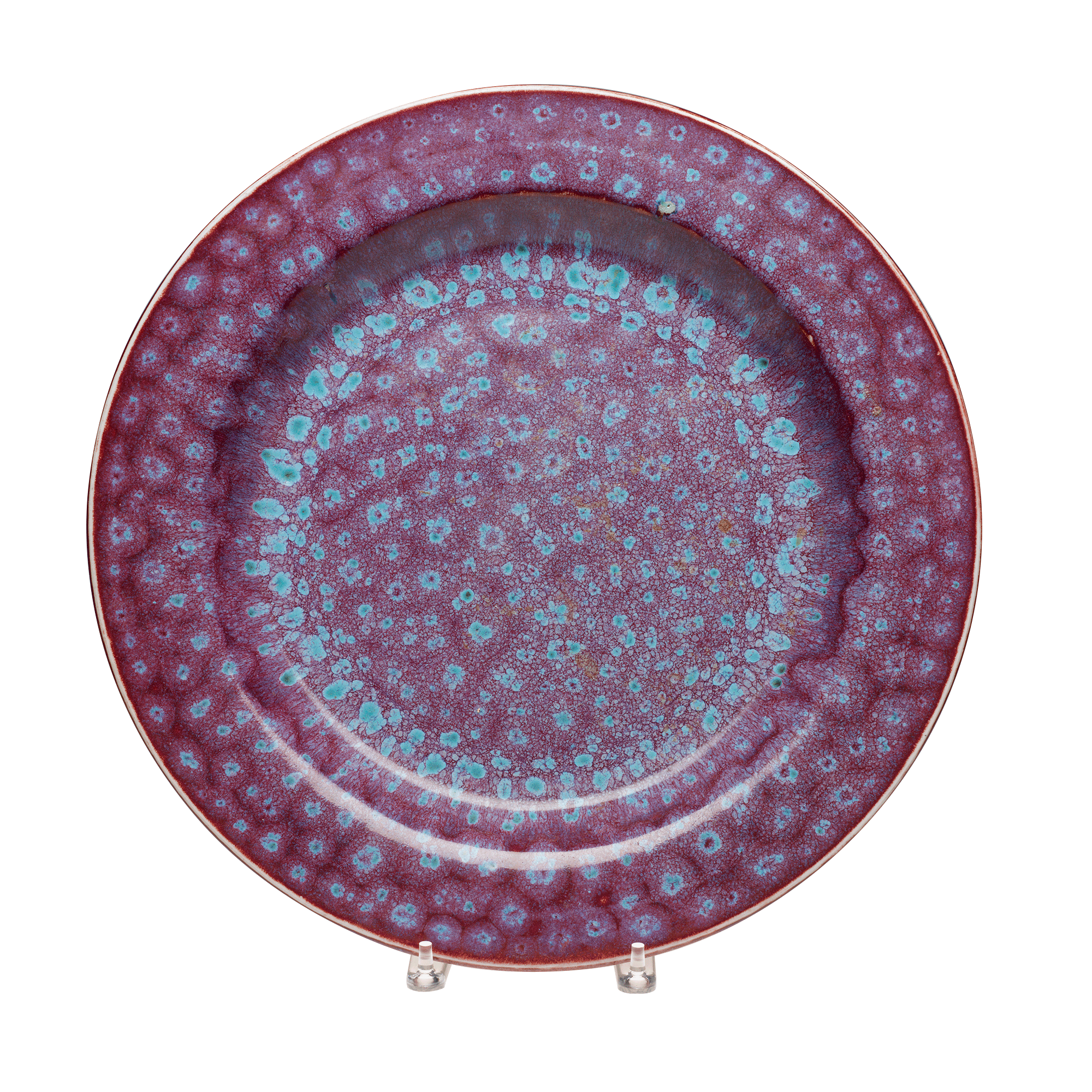 /Circular%20plate%20with%20dark%20purple%20glaze%20and%20spots%20of%20light%20blue%20glaze%20in%20concentric%20circles.