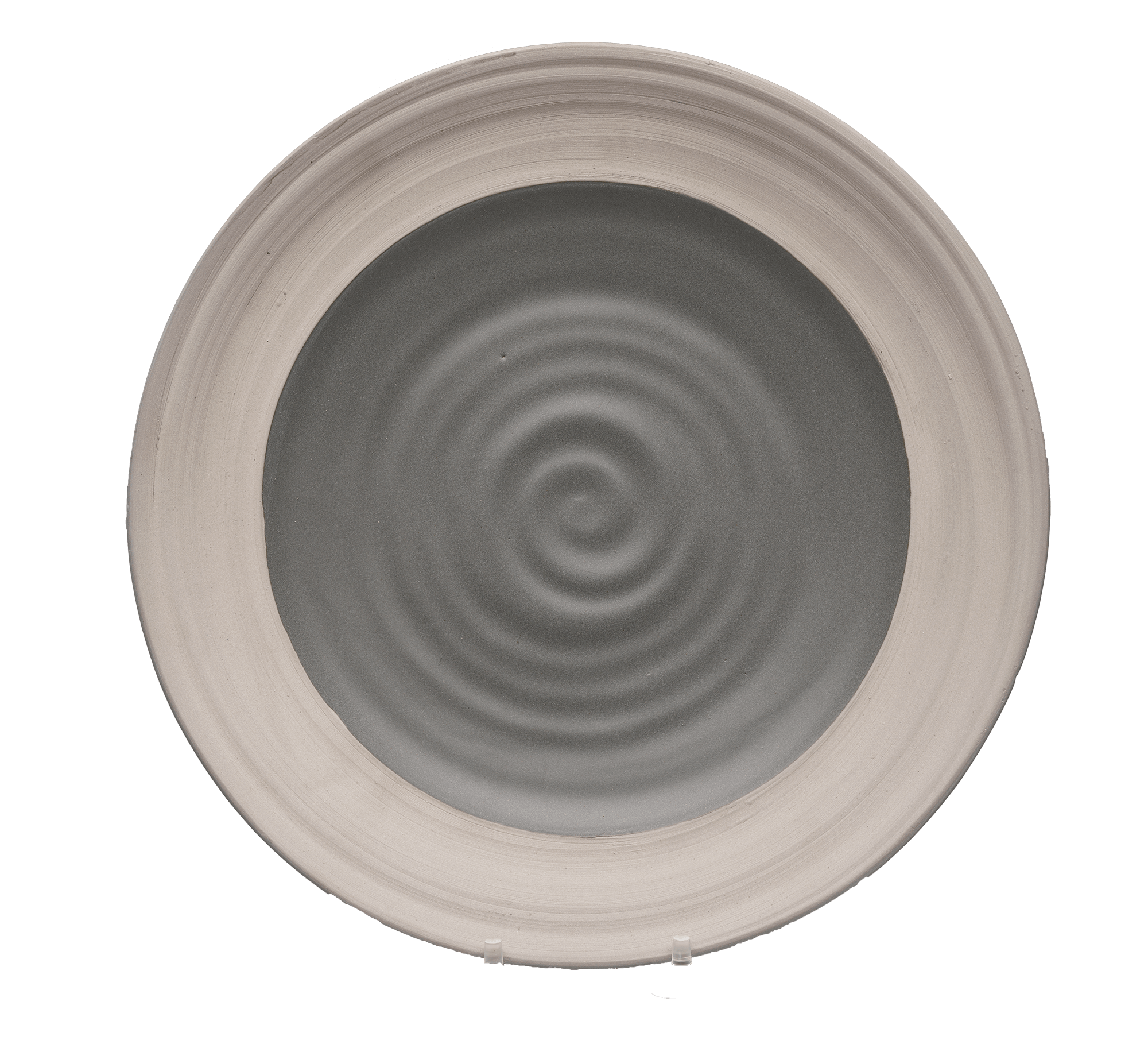 /A%20circular%20plate%20with%20a%20spiraling%20dark%20grey%20center%20and%20a%20wide%20light%20gray%20rim.