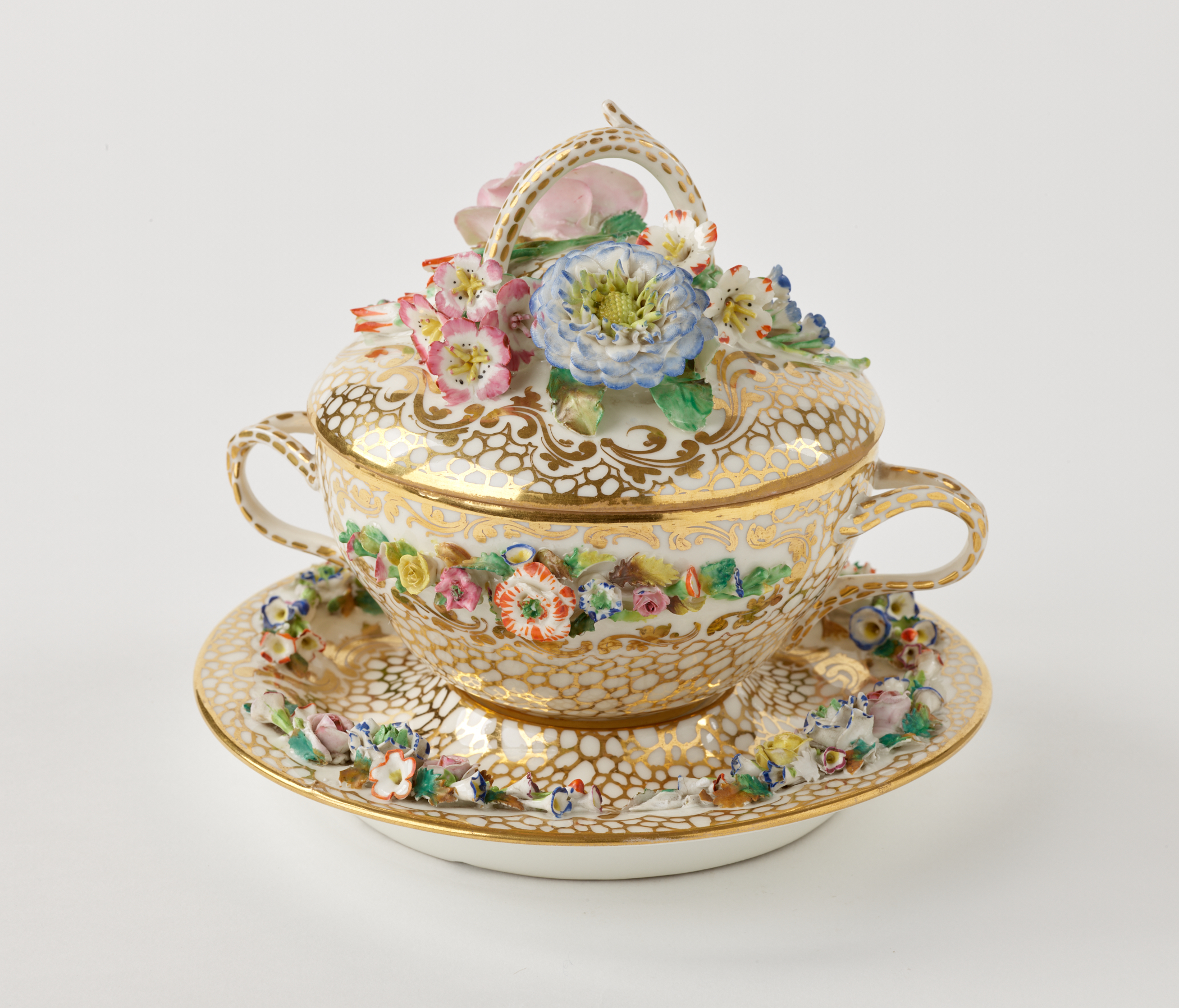 /A%20porcelain%20two%20handled%20covered%20bowl%20and%20fitted%20saucer.%20The%20decorations%20are%20gold%2C%20pink%2C%20green%20and%20are%20floral.%20
