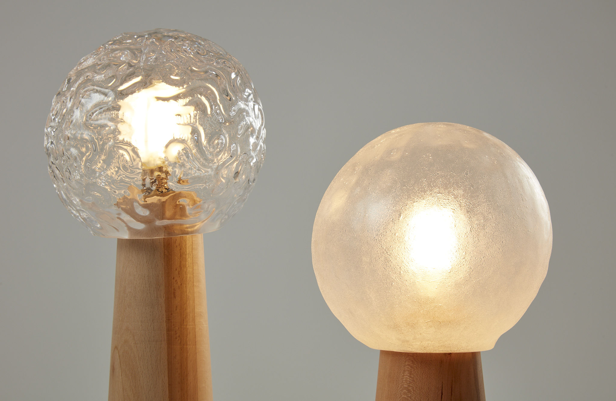 /Detail%20of%20Table%20Lamps%20made%20of%20glassblown%20glass%2C%20beech%2C%20cherry%20and%20lightbulb.