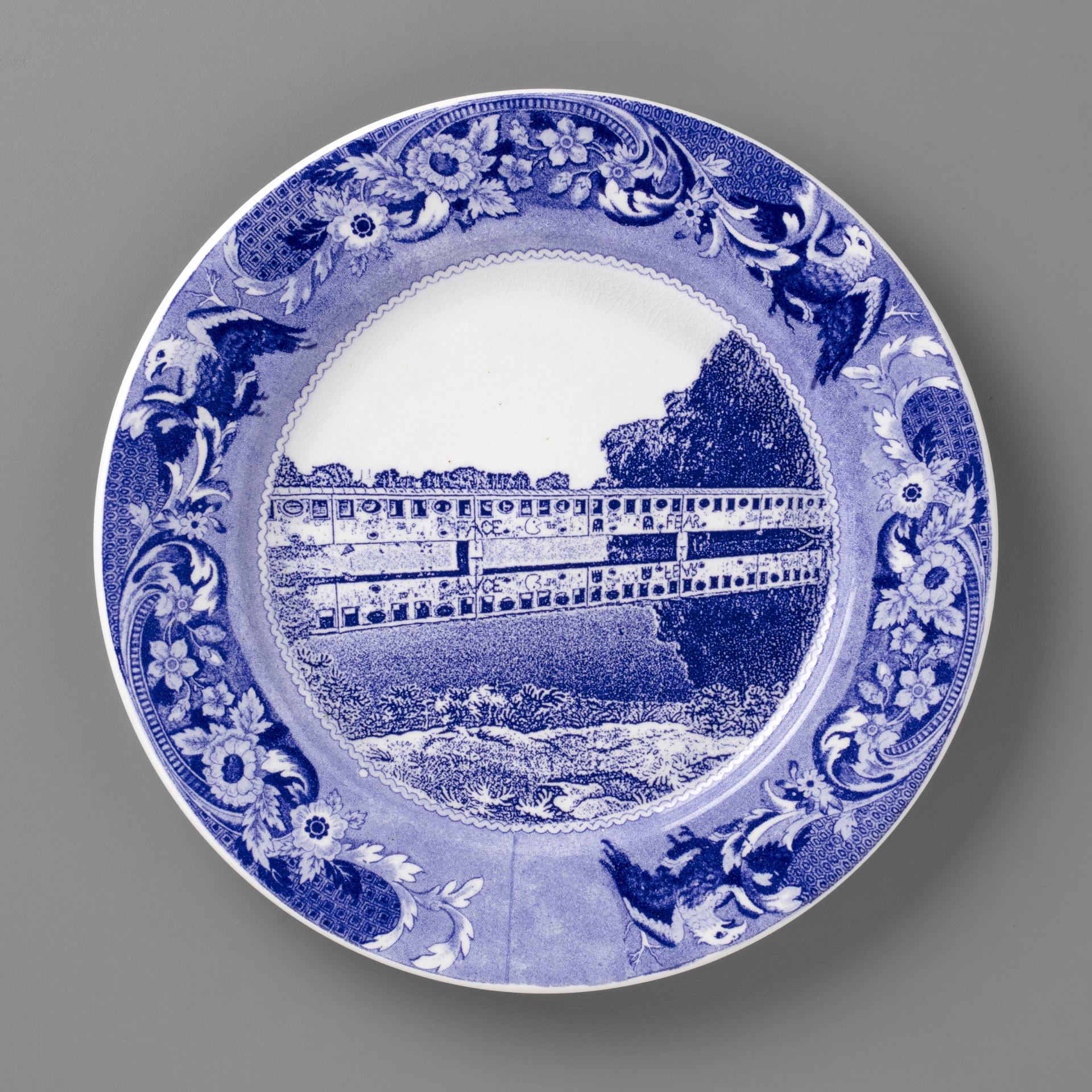 blue and white transferware plate depicting a covered bridge in Detroit