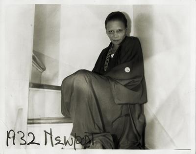 Nancy Elizabeth Prophet sitting in a stairwell