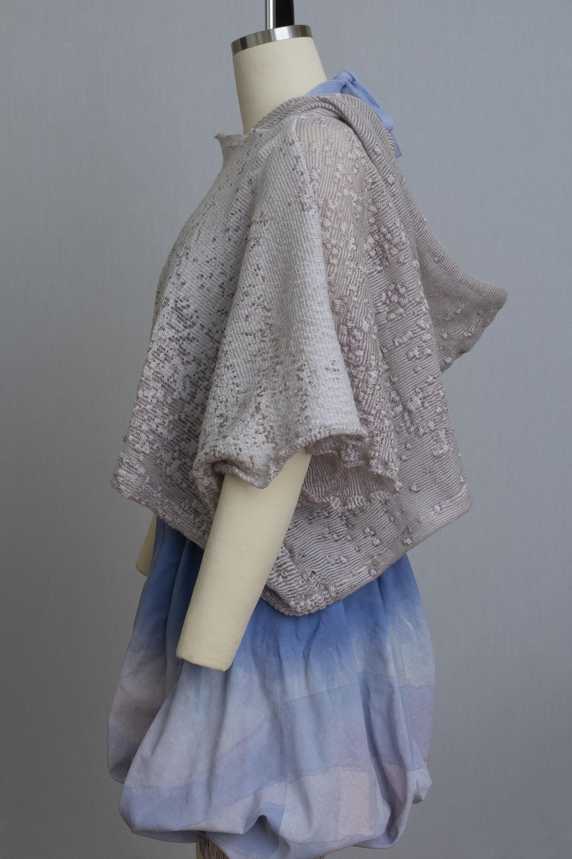 dress form wearing bloomers and a grey knit hooded sweater
