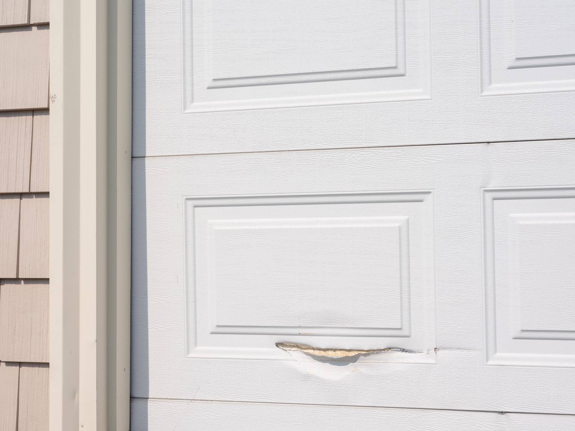 garage door with scar