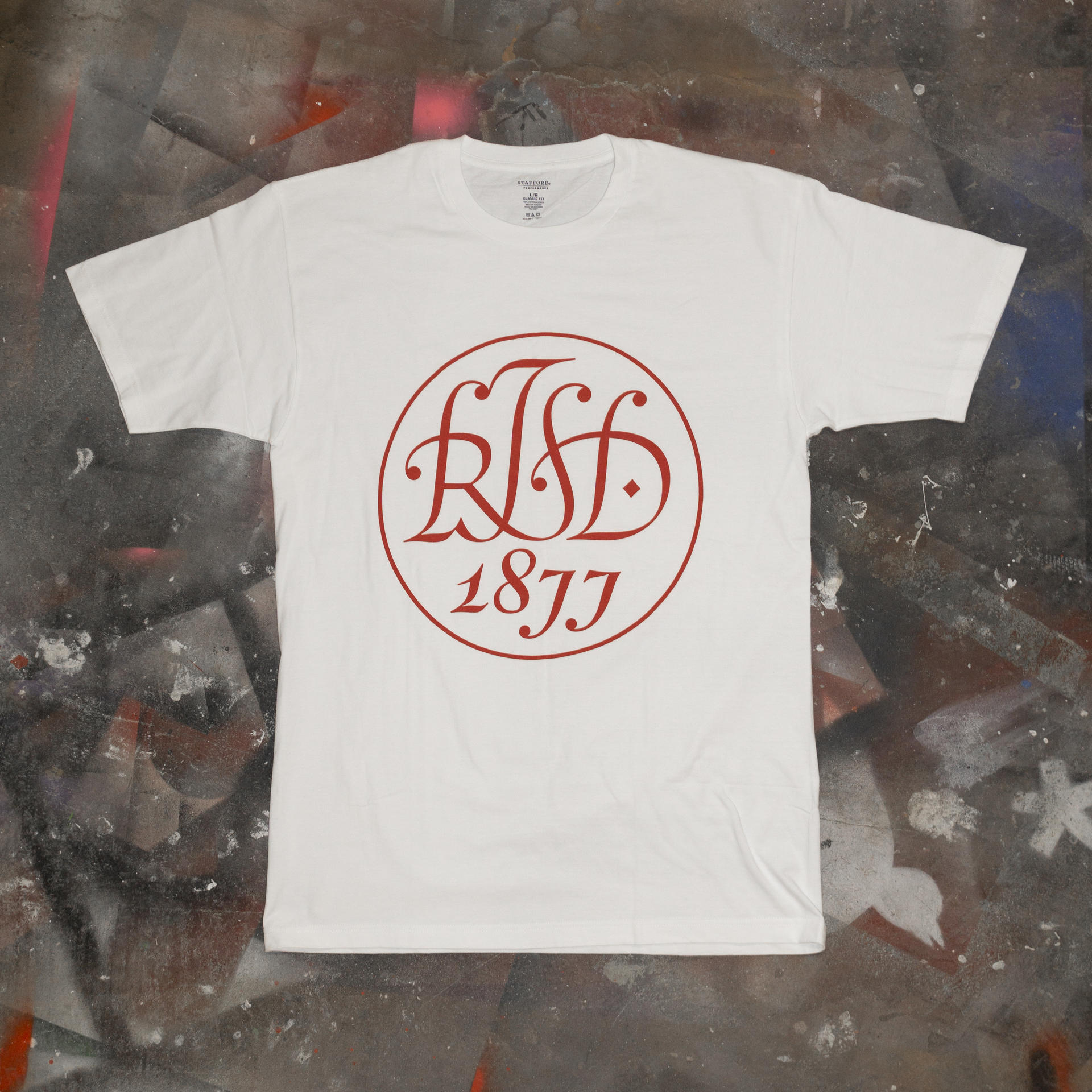 T-shirt design with a holiday version of the original "RISD 1877" seal designed by John Howard Benson