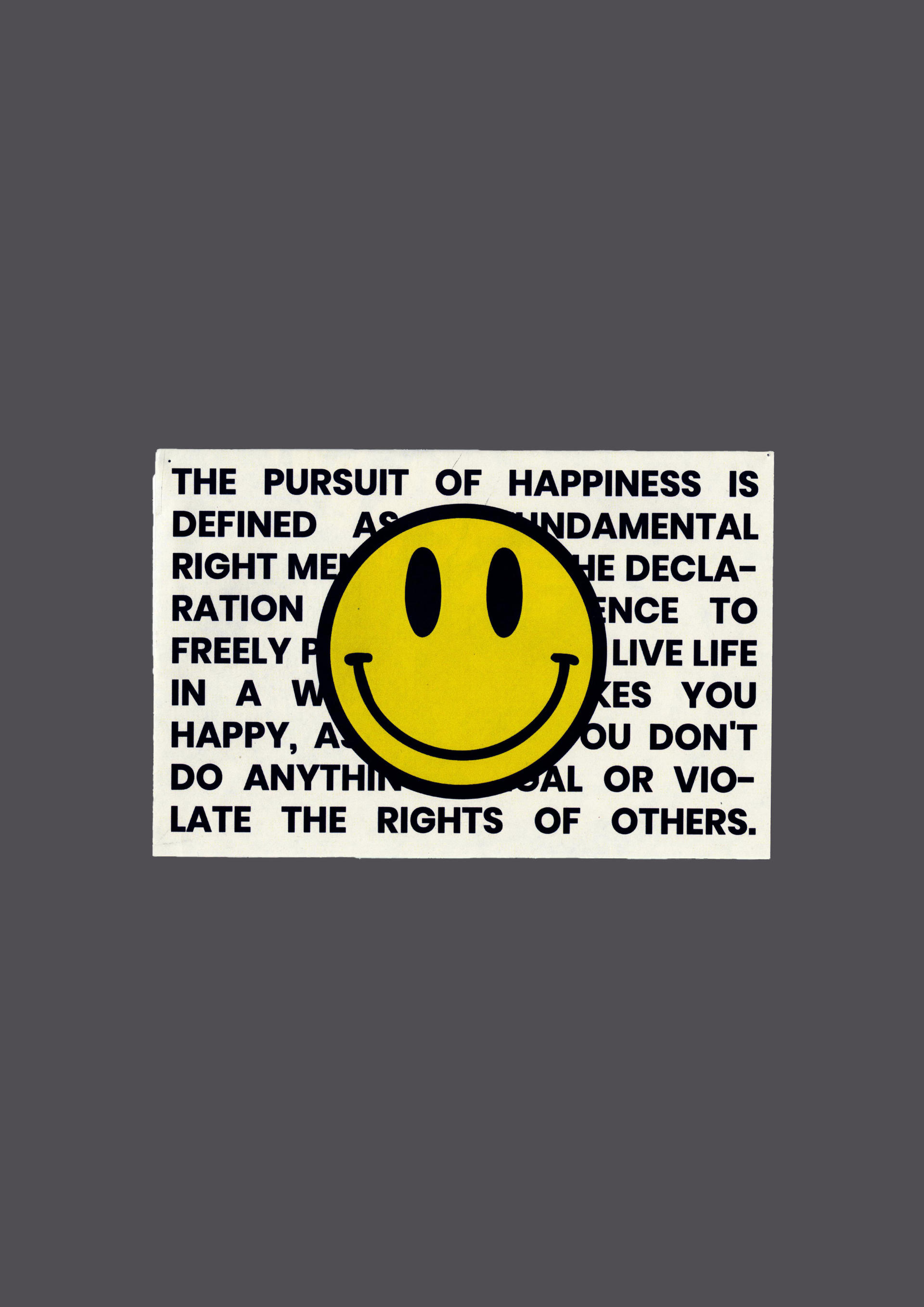 Smiley face graphic with text behind