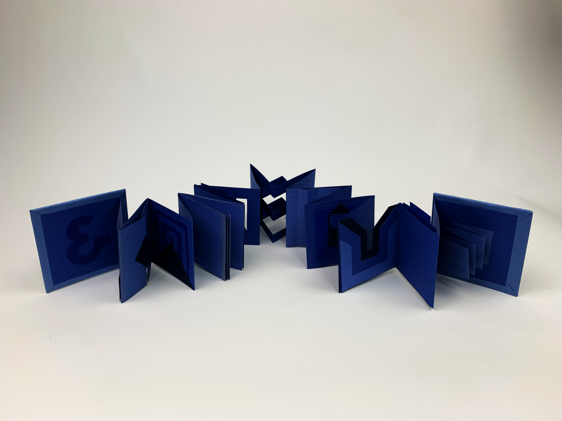 Folded blue accordian paper