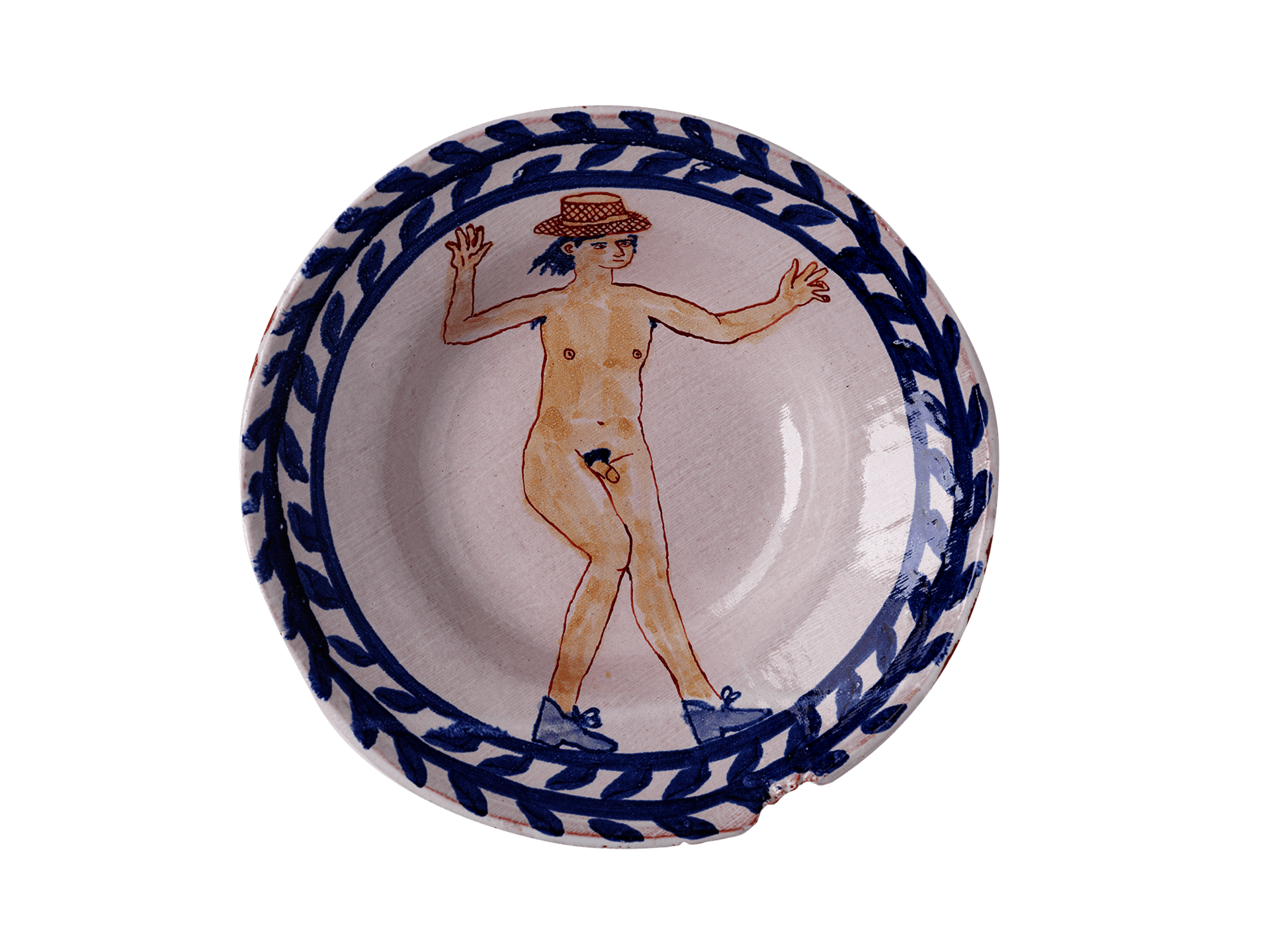 Ceramic plate with a decorative floral border and an illustration of a dancing nude man wearing a full-brimmed hat and shoes