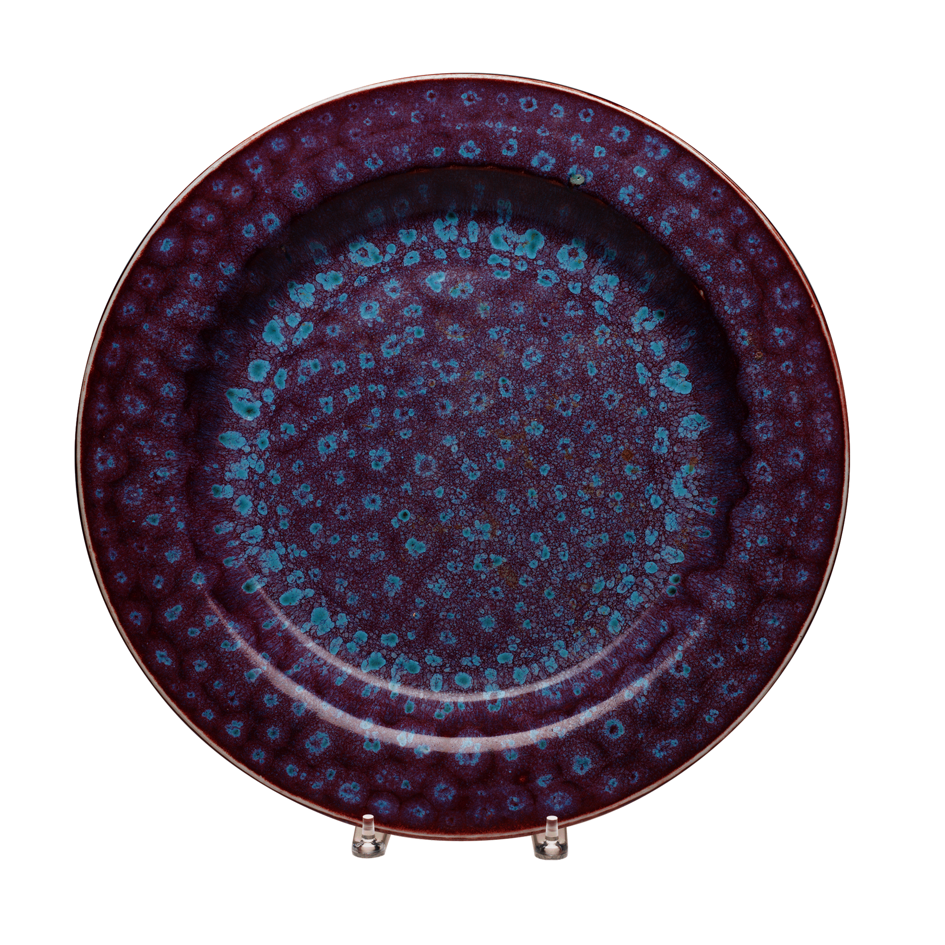 Round porcelain plate with purple and blue speckled glaze