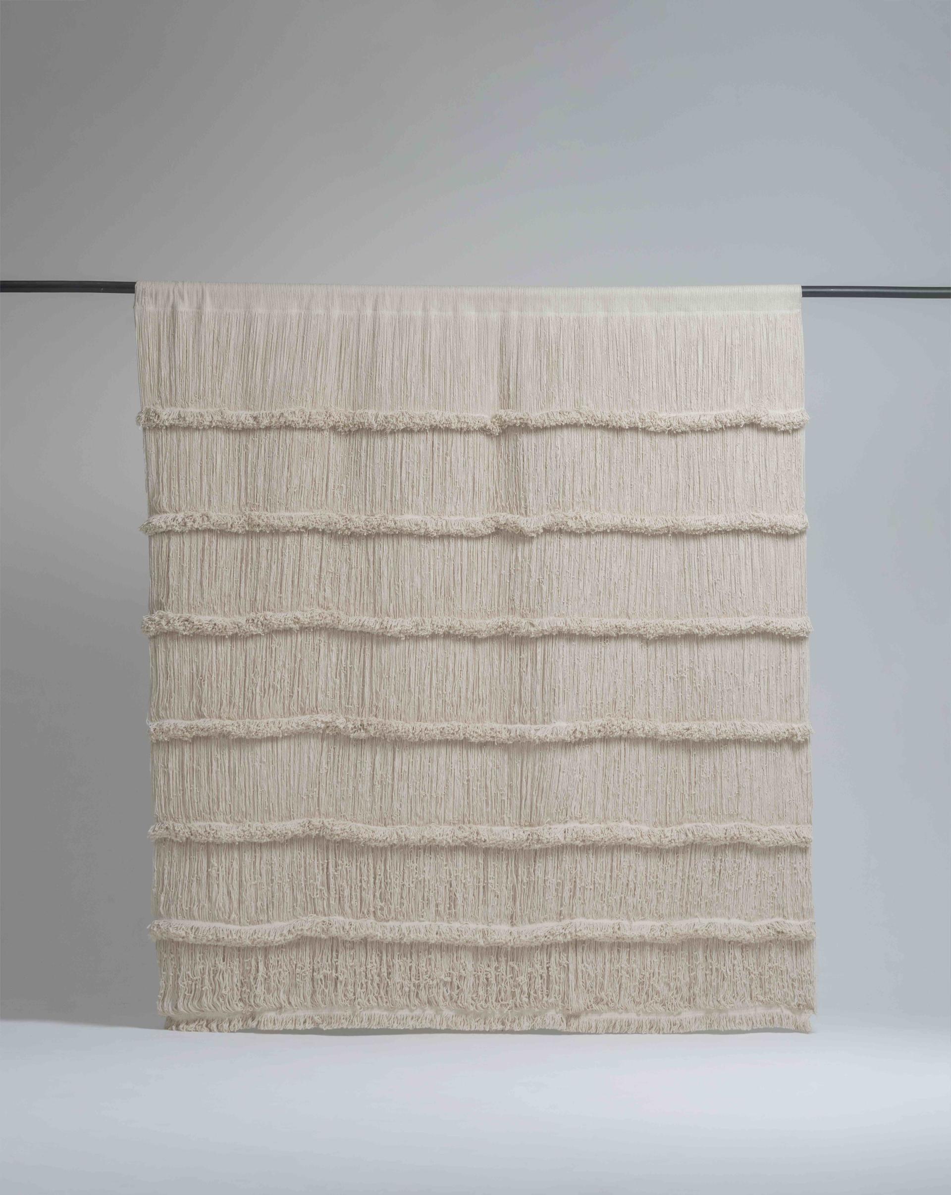 Weaved cotton curtain hanging from rod final picture