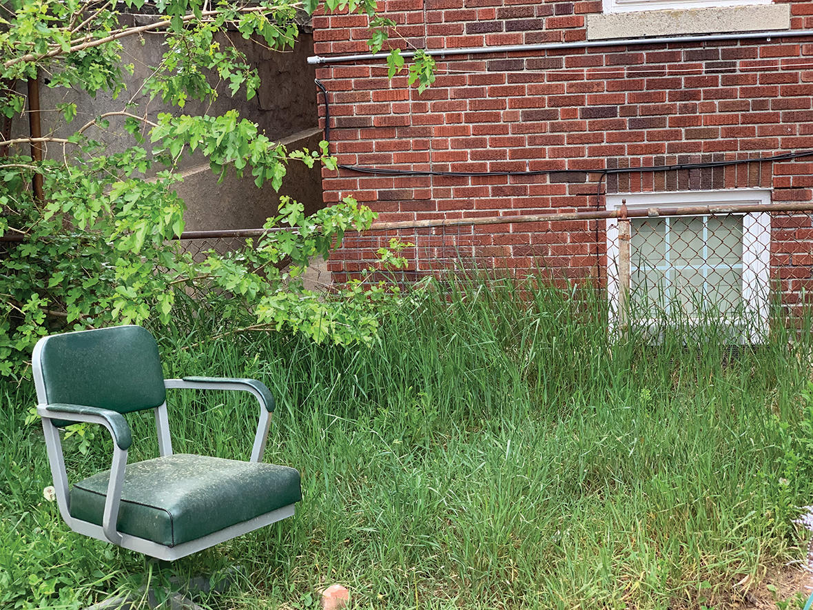 green chair green grass