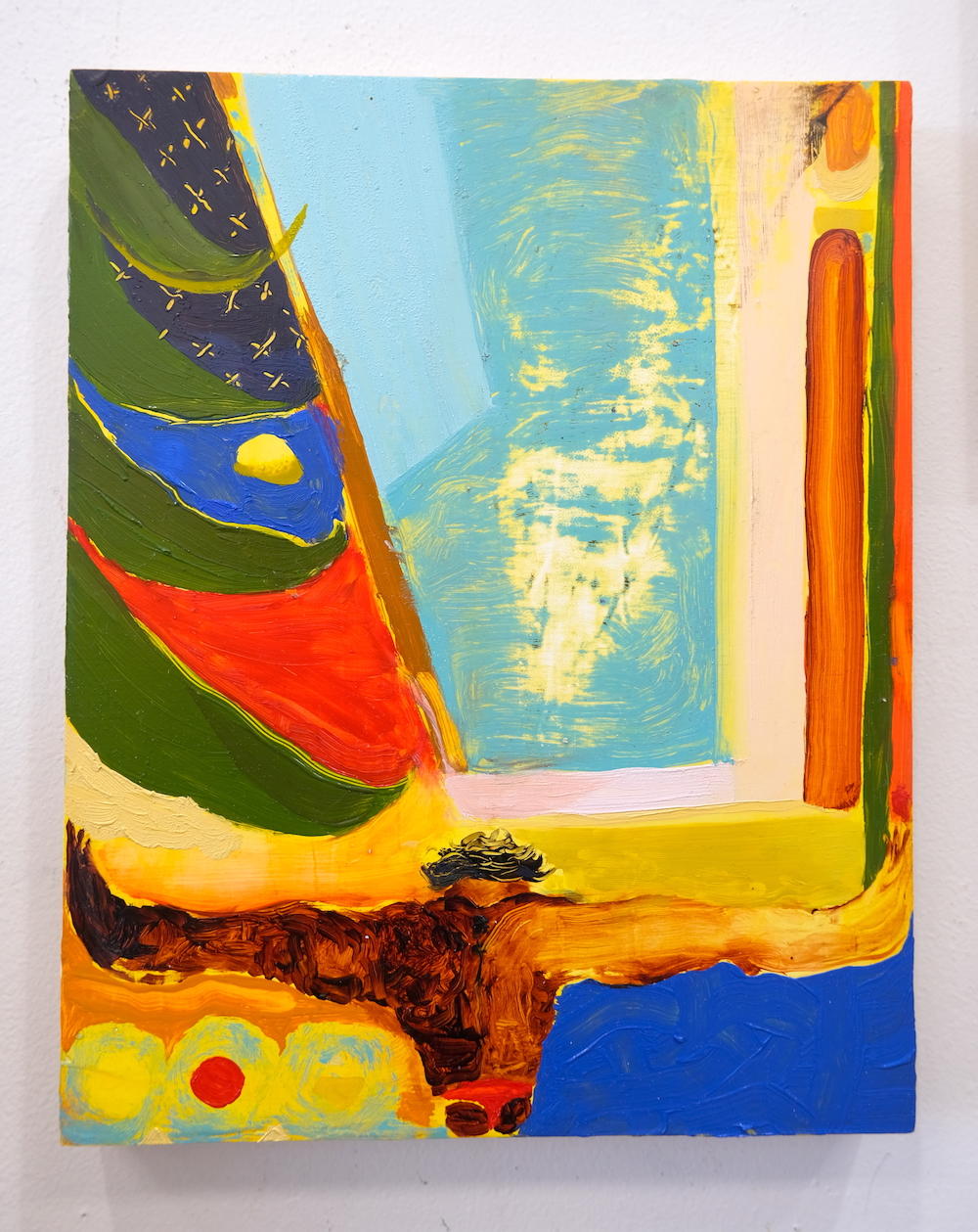 Photo of a small oil painting in primary colors. A figure with arms outstretched in a "T" at the bottom of the panel holds up the painting and faces a pool.