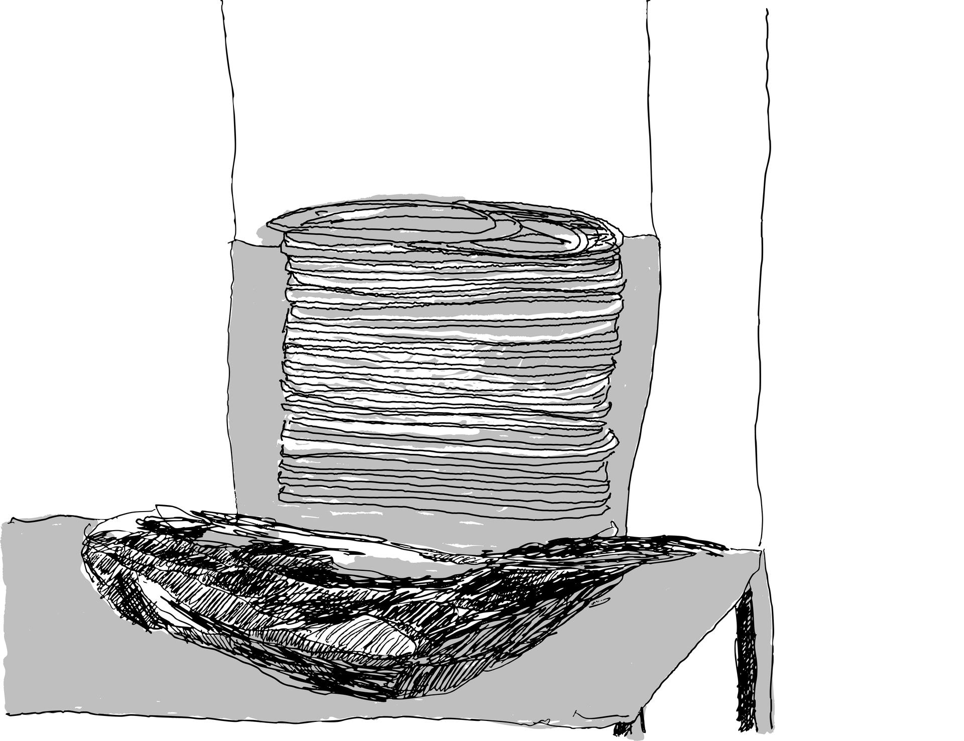drawing of a scribbly spring on top of a pile of black lines on top of a grey table