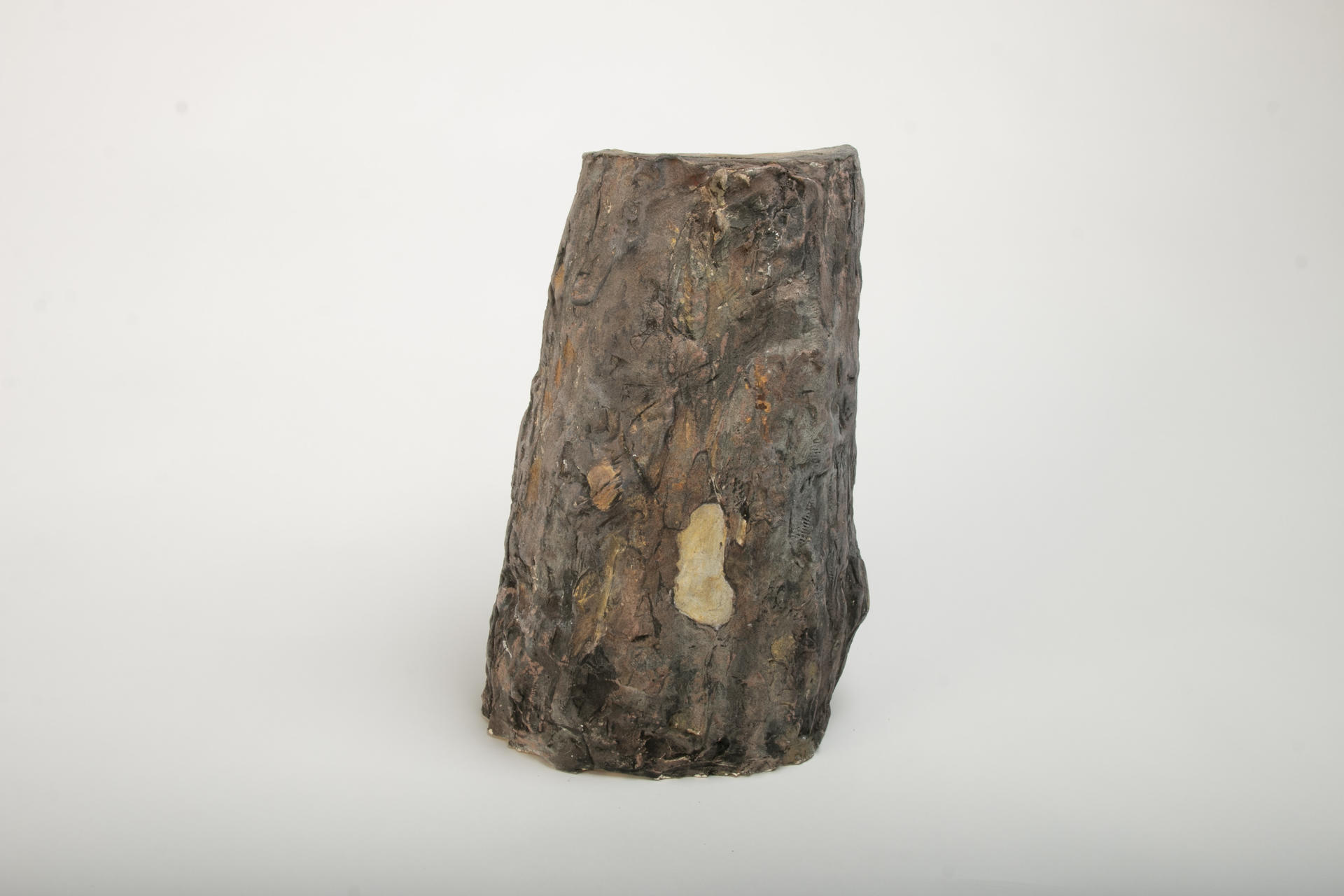 image of ceramic piece resembling a tree trunk
