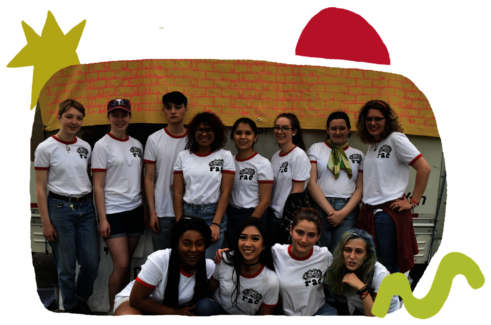 A group of twelve teens in matching white shirts poses happily in two rows.