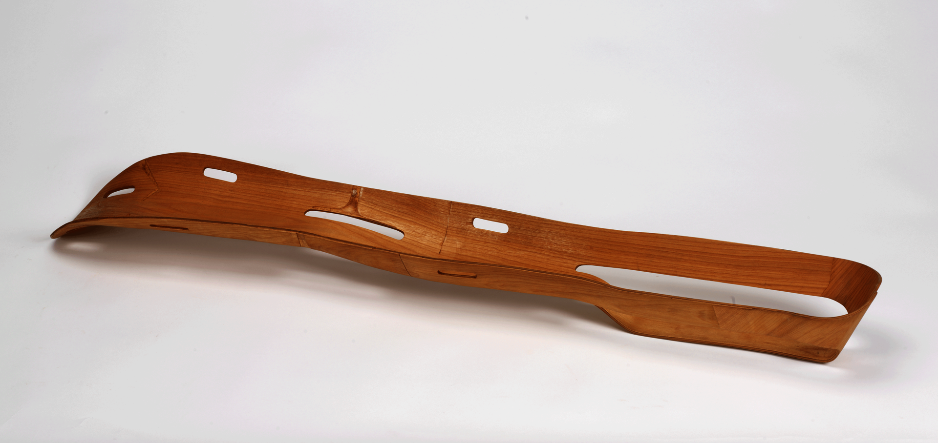 Photo of a wooden support made for leg injuries.