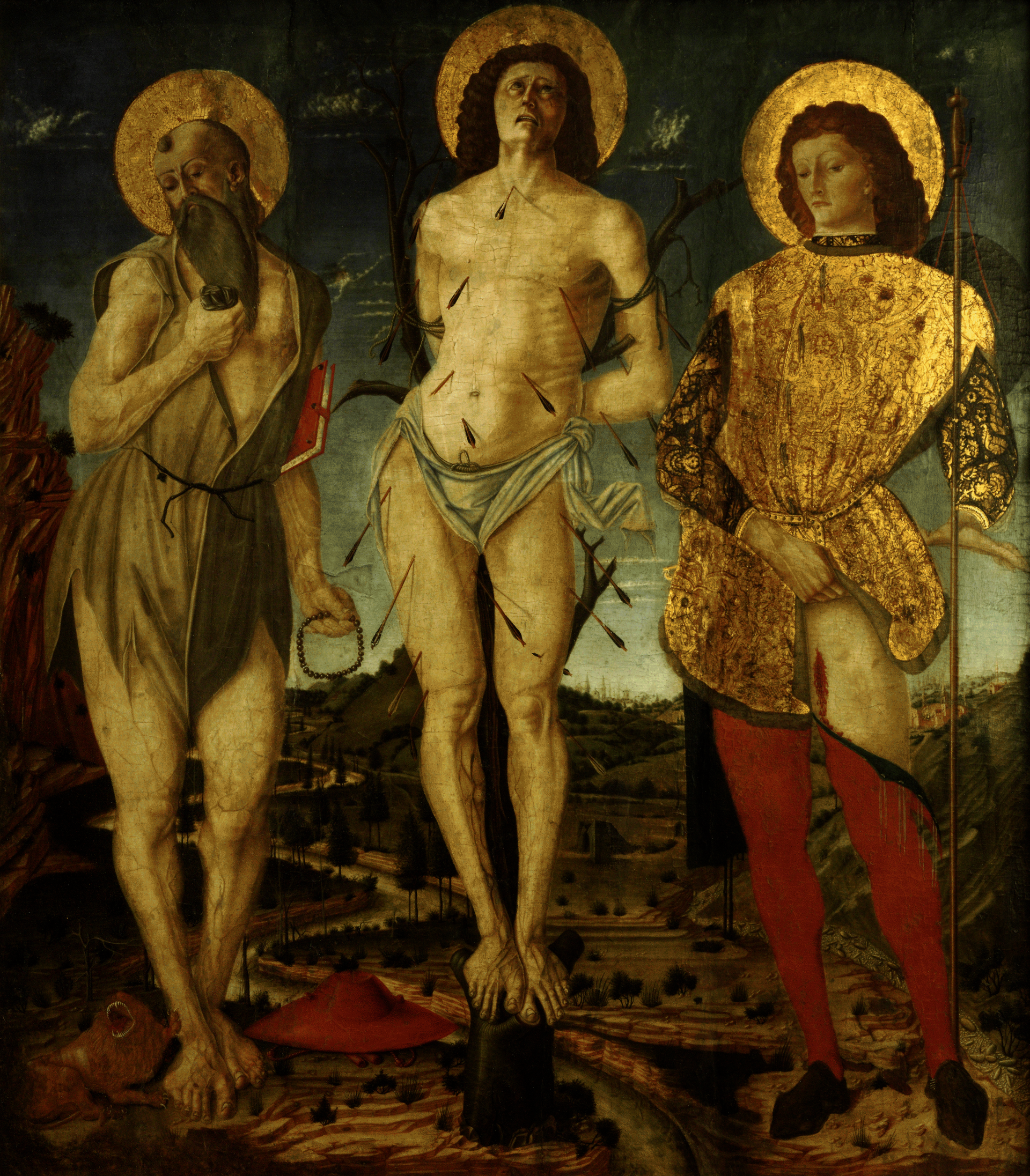 Painting in rich tones of three gold-haloed figures. From left: old man wearing rags, nearly naked man pierced with arrows, young man wearing fancy clothing displays his injured thigh.