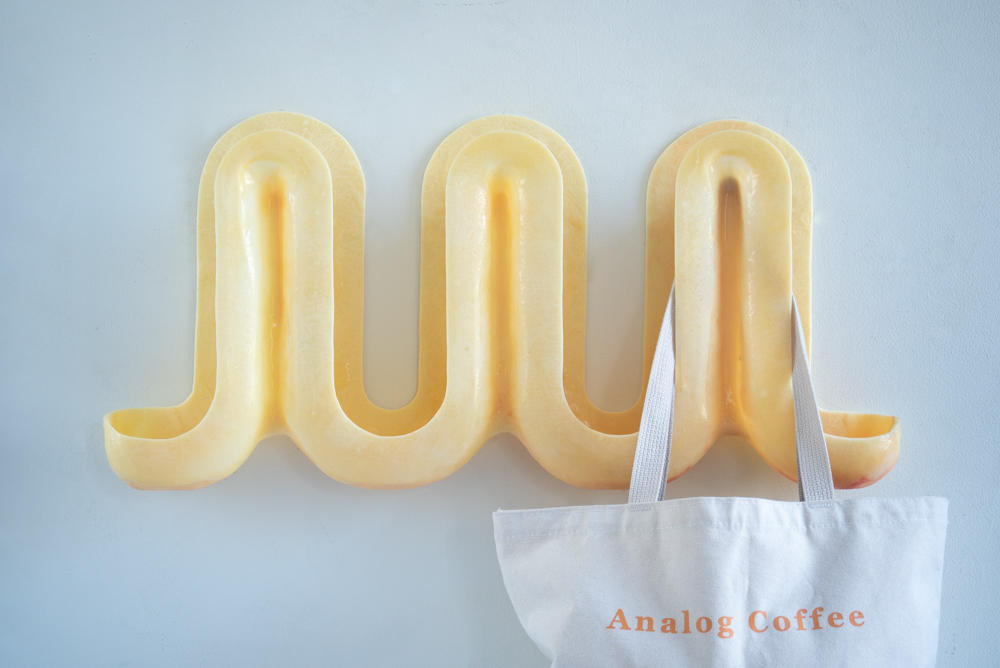 Three yellow swells in a line.