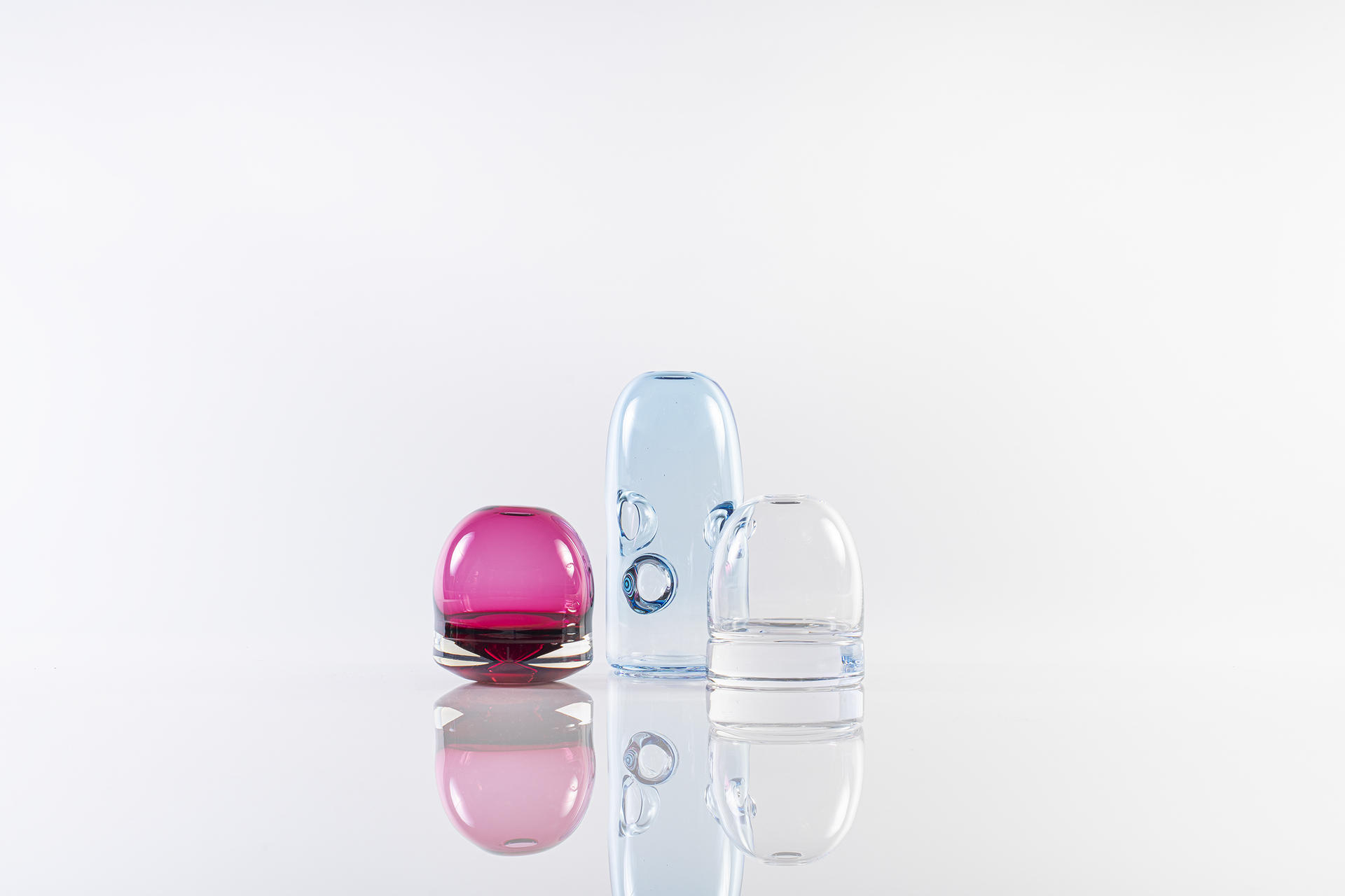 Three hand blown glass vase