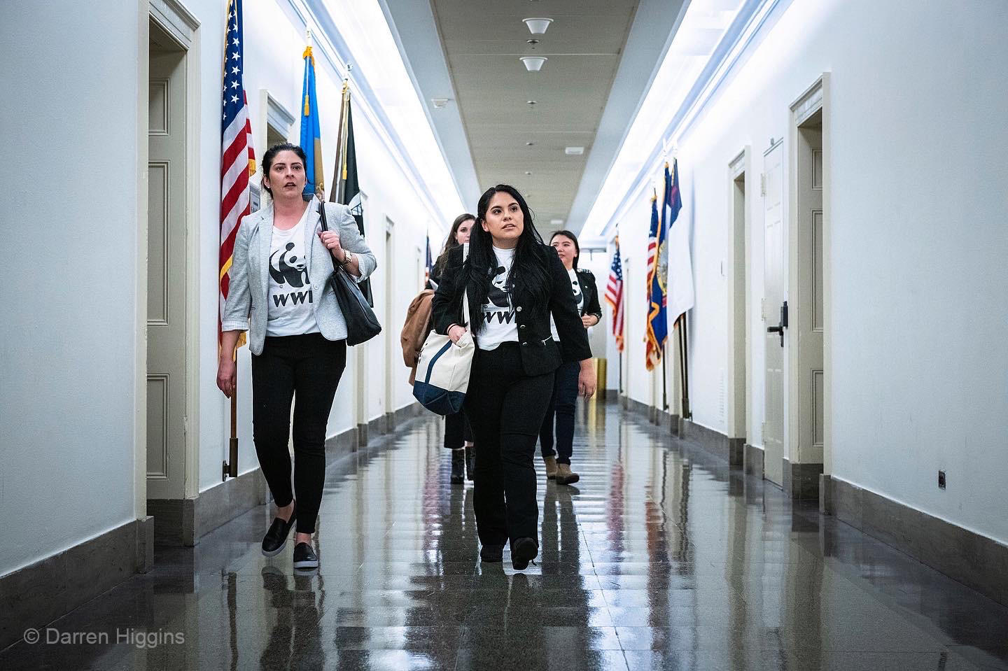 World Wildlife Fund activists walk around Capitol Hill