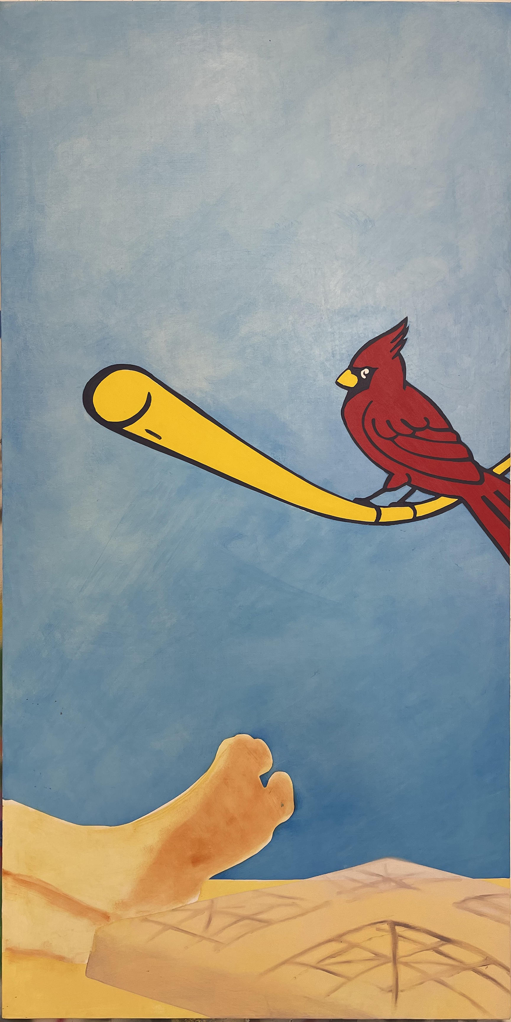a foot and a cardinal perched on a baseball bat