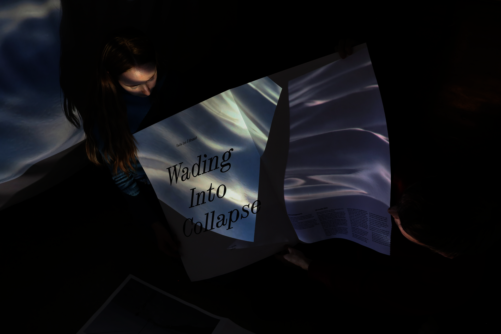 A projection of a video overlaid on a publication. 