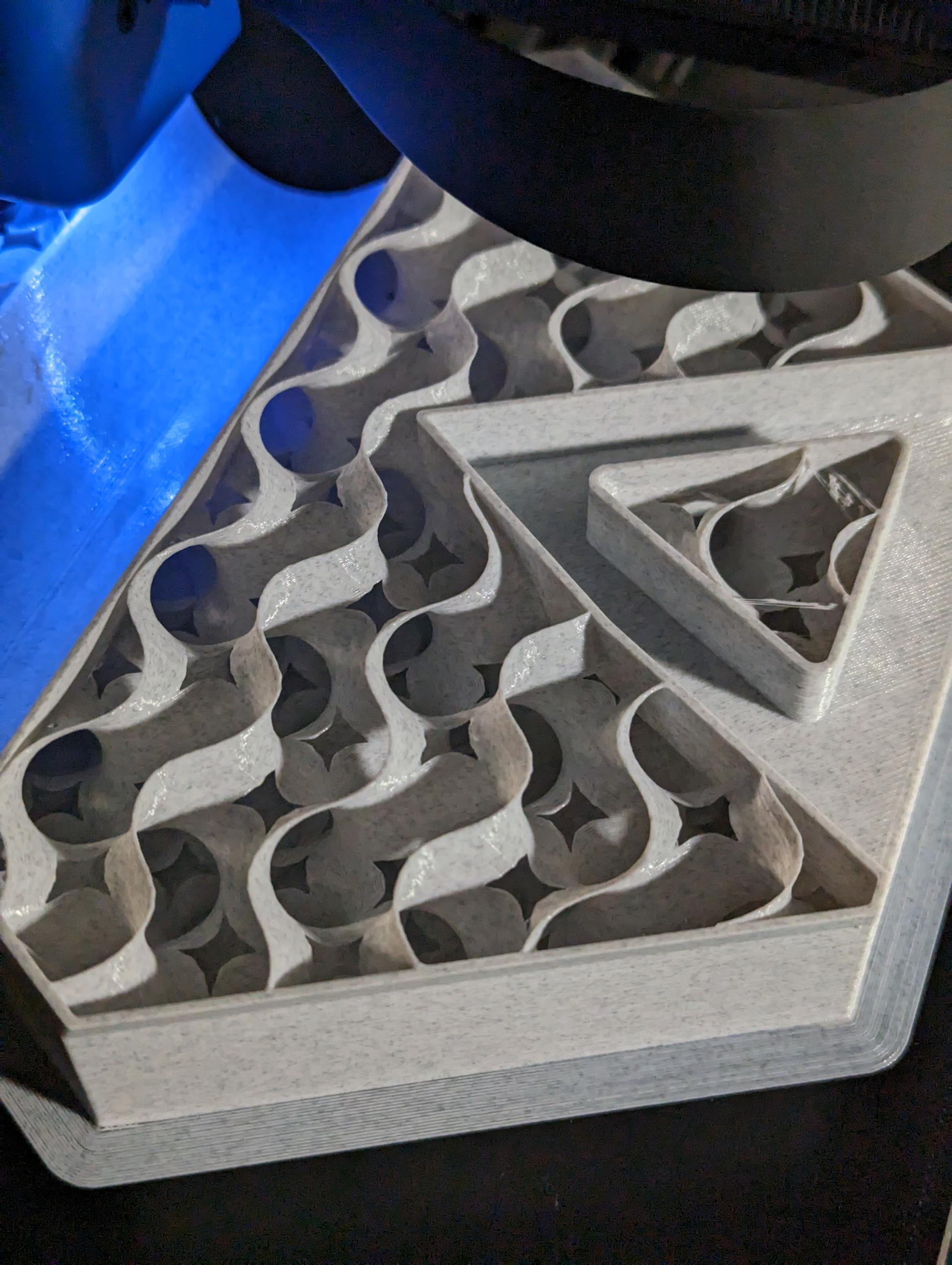 3D printer creates gyroid infill pattern on the full scale block.
