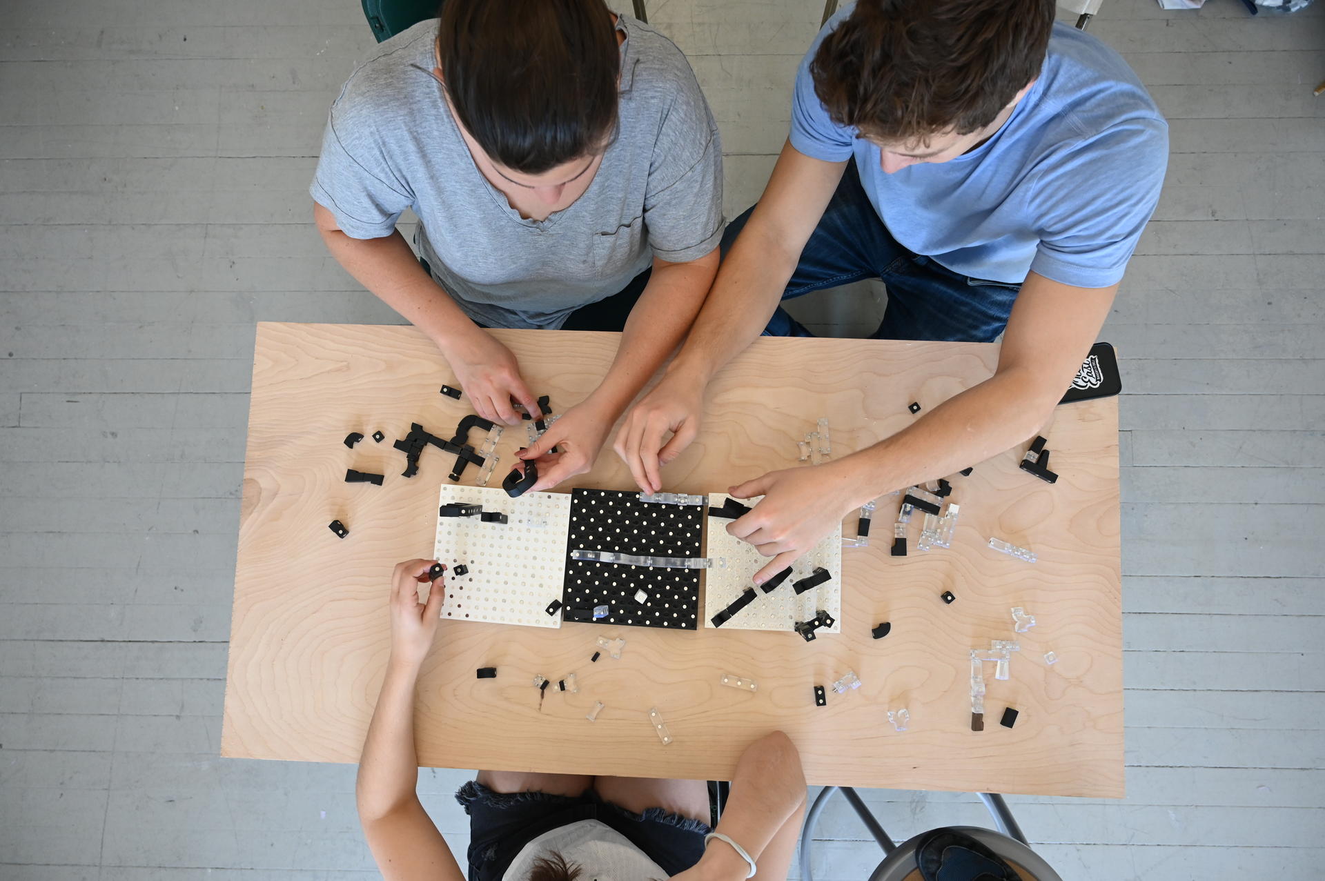 People playing with block pieces