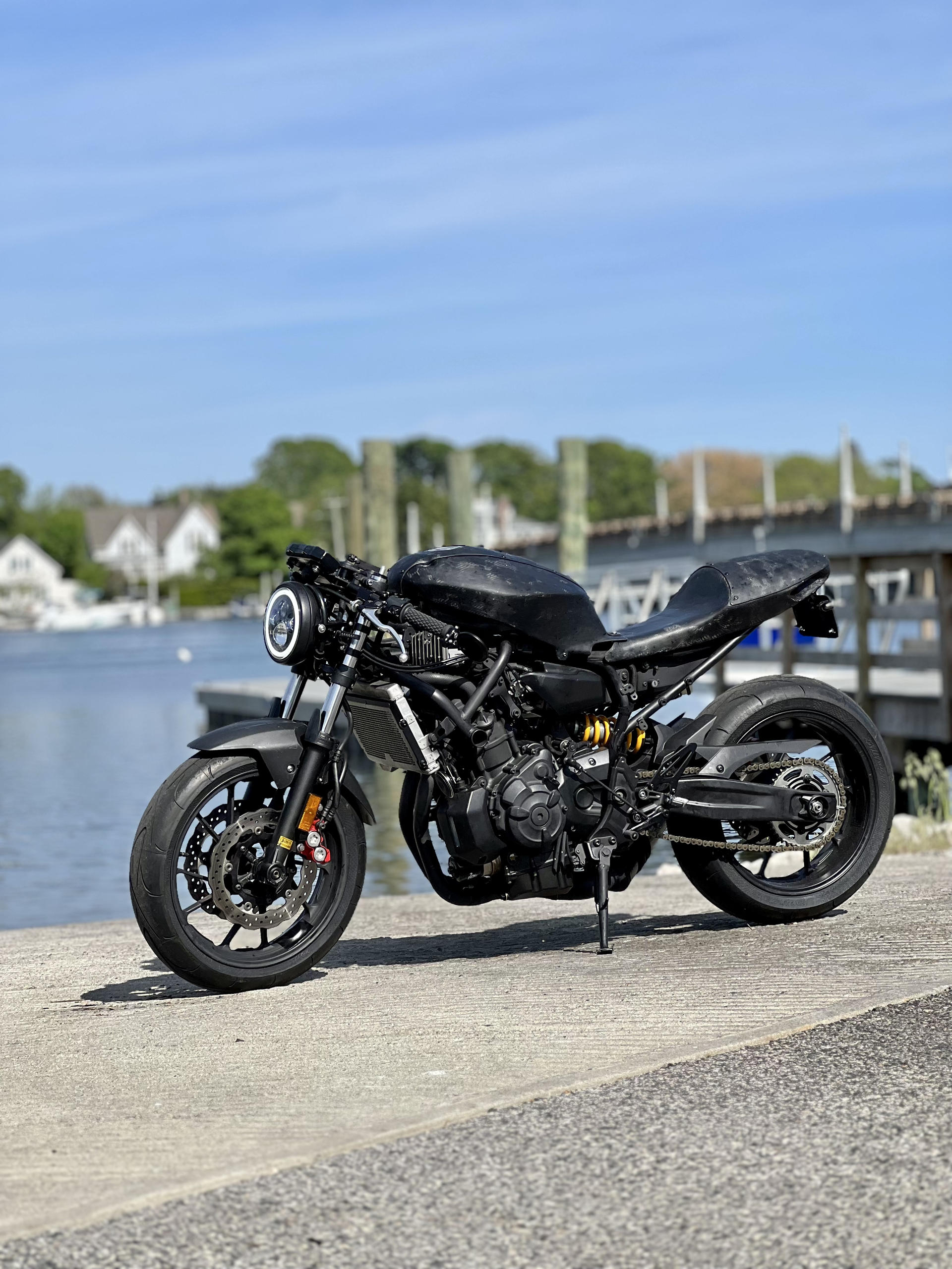 Custom motorcycle at a bridge