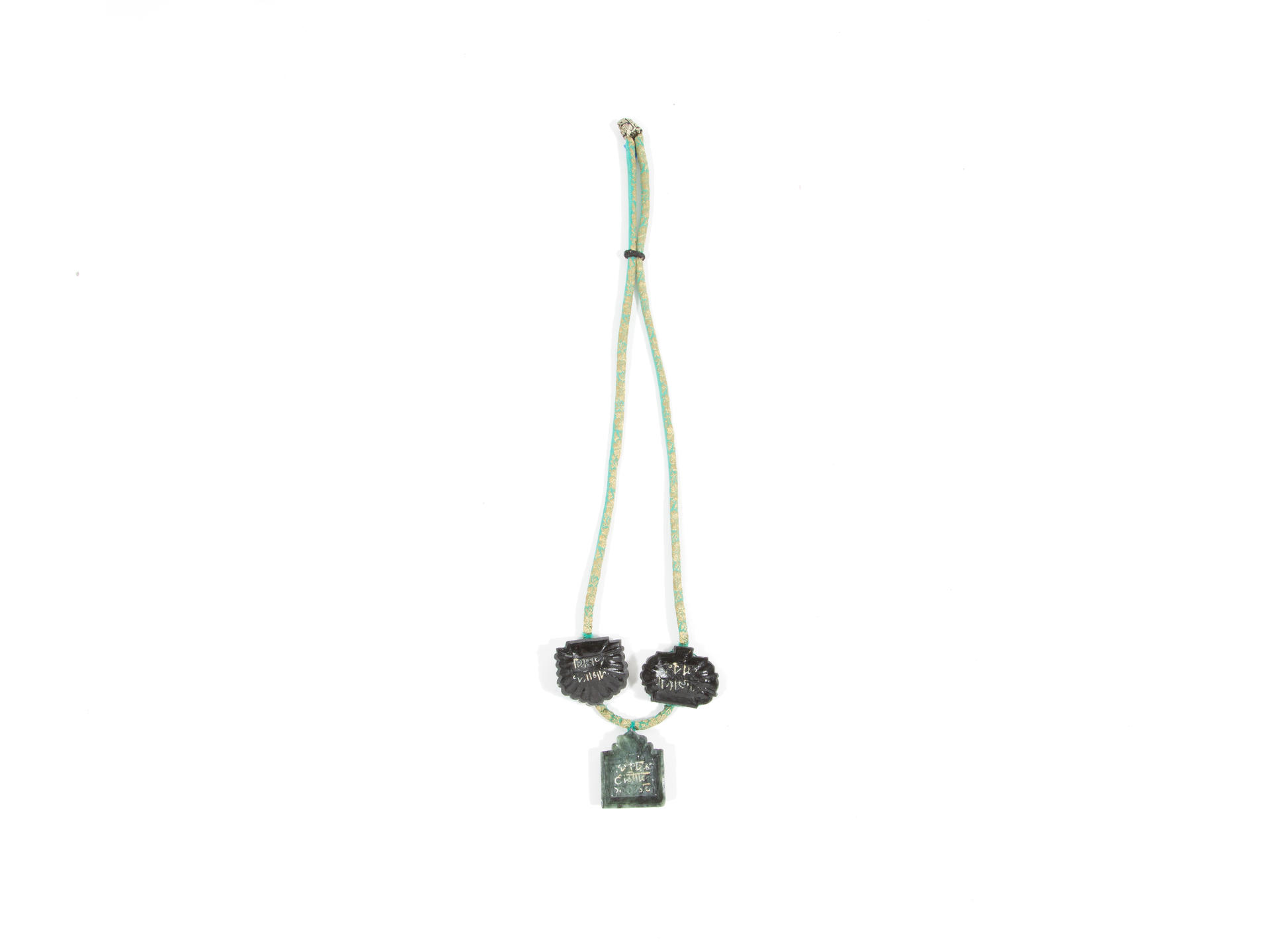Necklace made with five soapstone confection molds and saree fabric.
