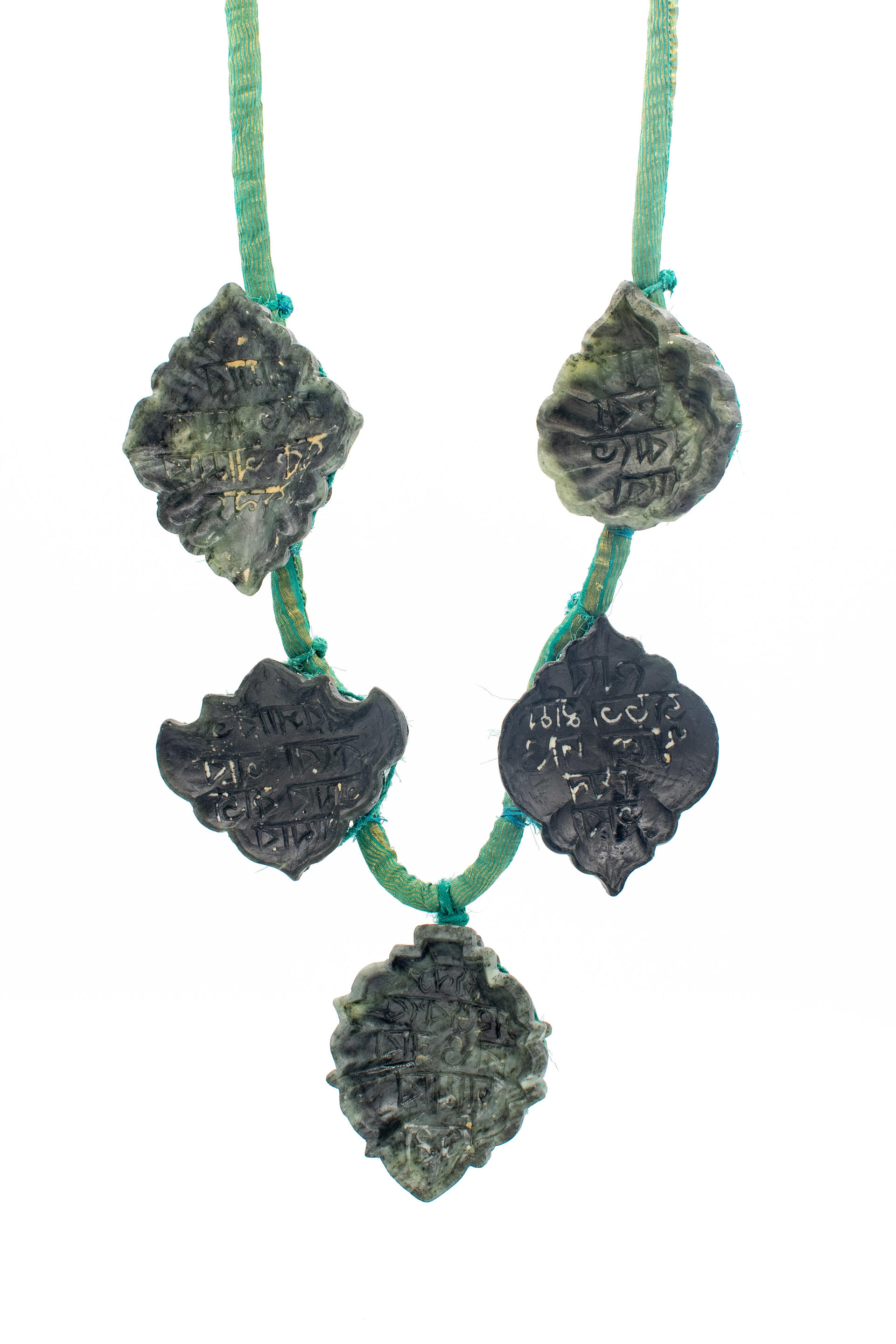 Necklace made with three soapstone confection molds and saree fabric.