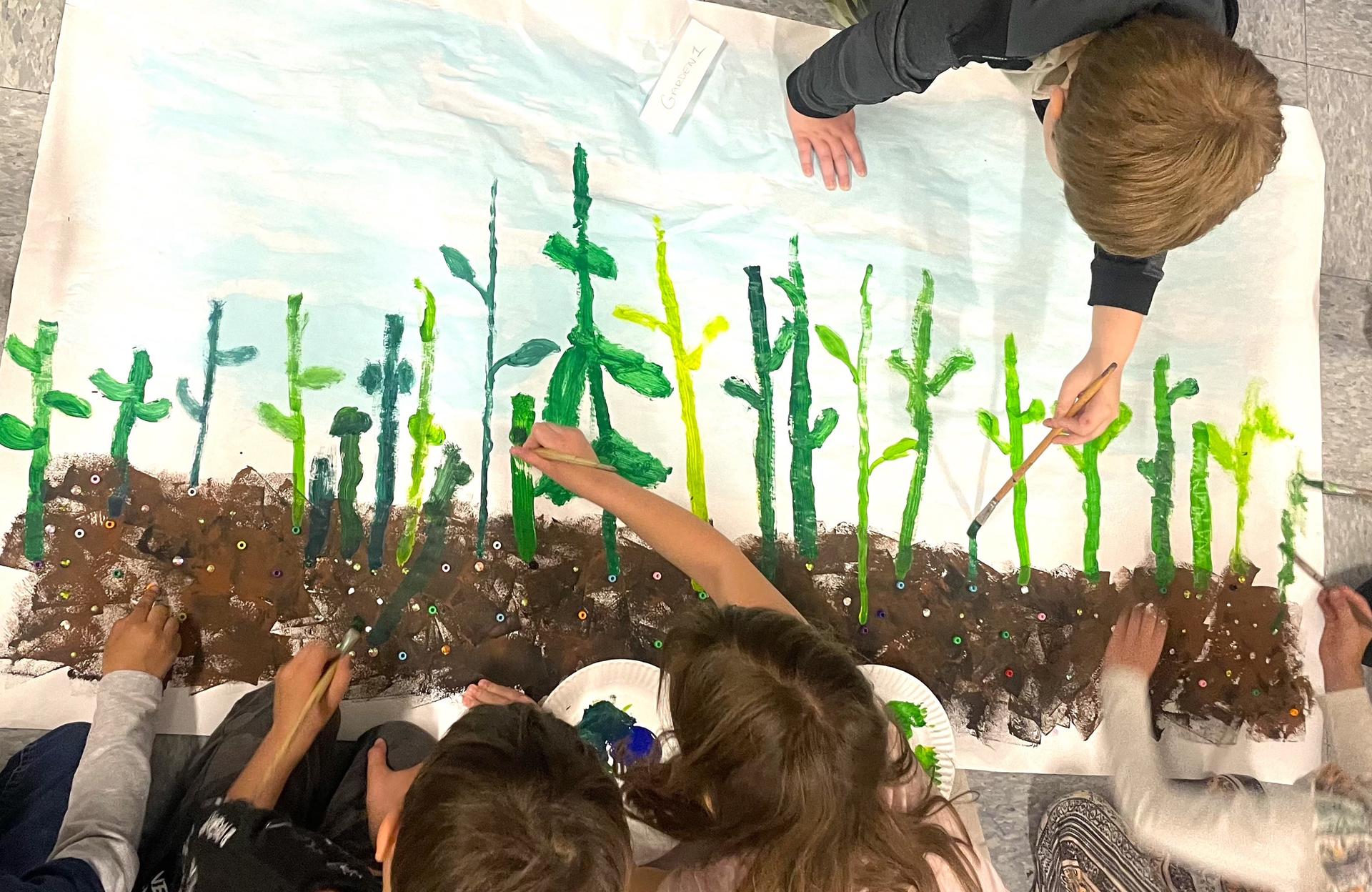 Grade 1, Quidnessett Elementary School “Growing Gardens Mural Project”  Students explore phases of plant life and demonstrate great teamwork!