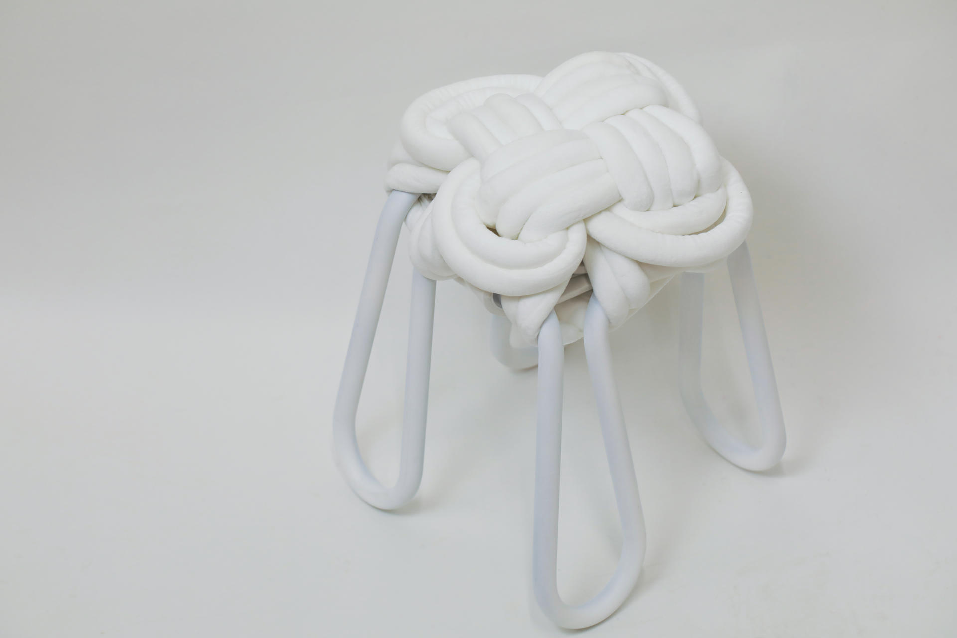 White knot stool on a white background