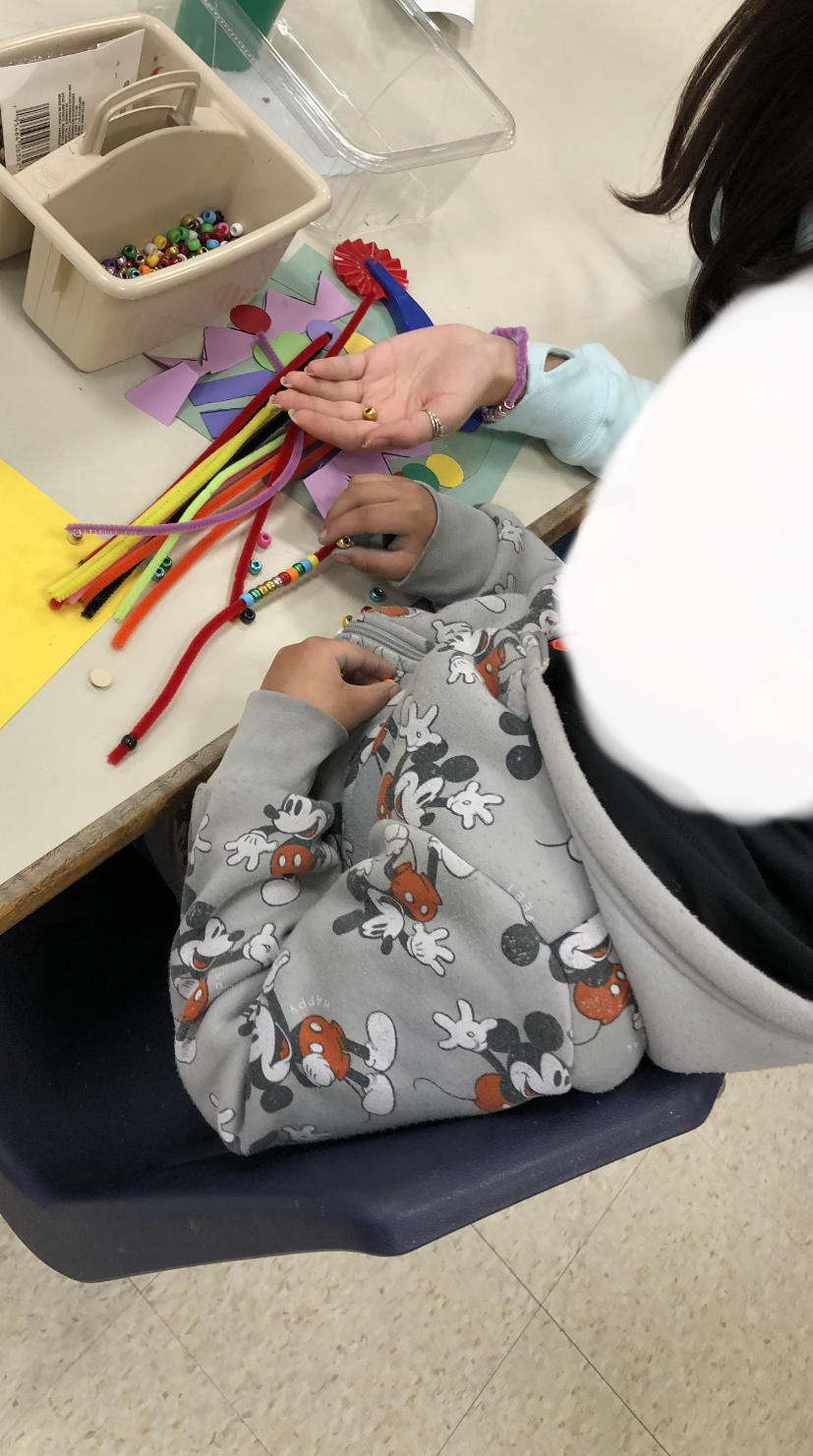 Intensive Special Education (ISE) class at Hugh Cole Elementary School working at stations with various sensory materials. Photographed by Lynne Ramos. 