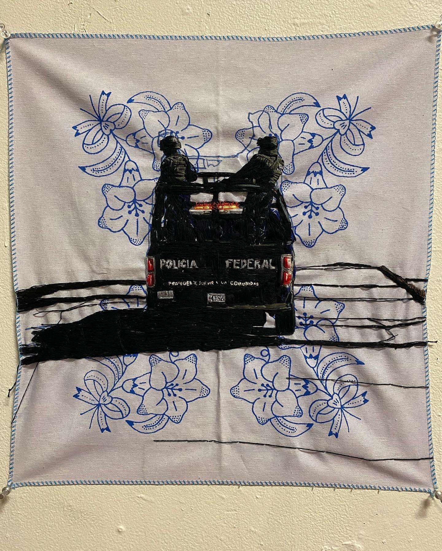 mexican federal police embroidered of on a cloth with floral pattern.