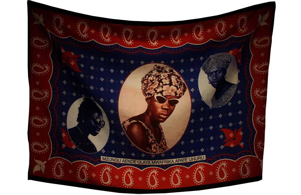 Blue and white imagery on fabric with images of women on it and words towards the bottom in Kiswahili