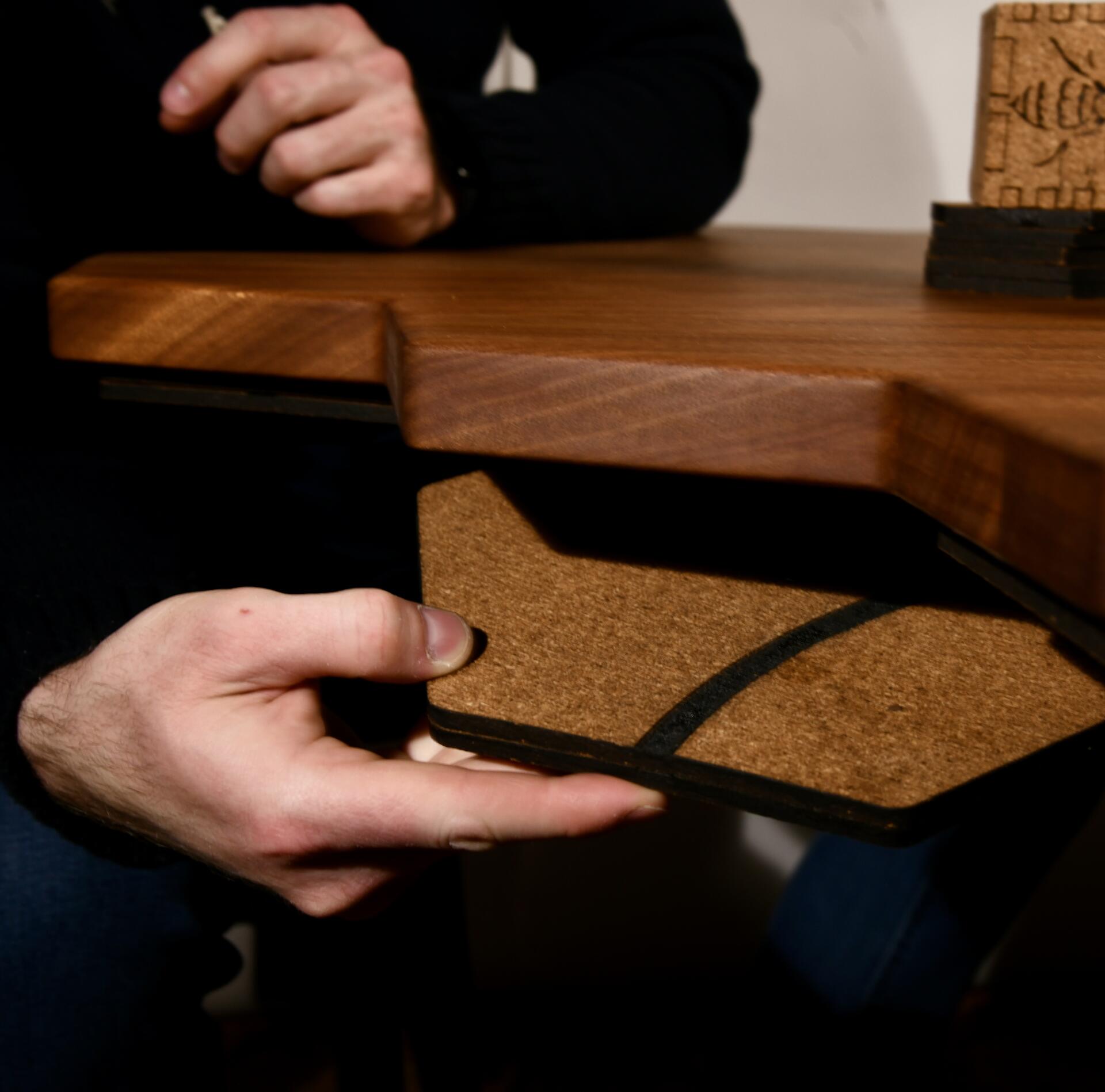 Hexagonal cork tile, tile magnetic, magnetic to bottom of the table. Accessible storage of game