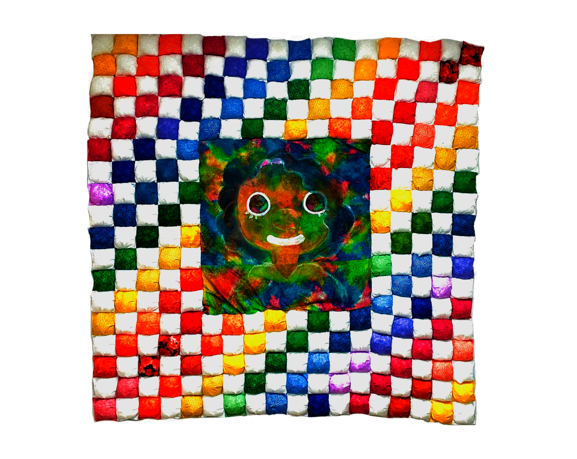A puff quilt of white and all colors made up of many small squares. The middle of the quilt contains an image of a little girl smiling.