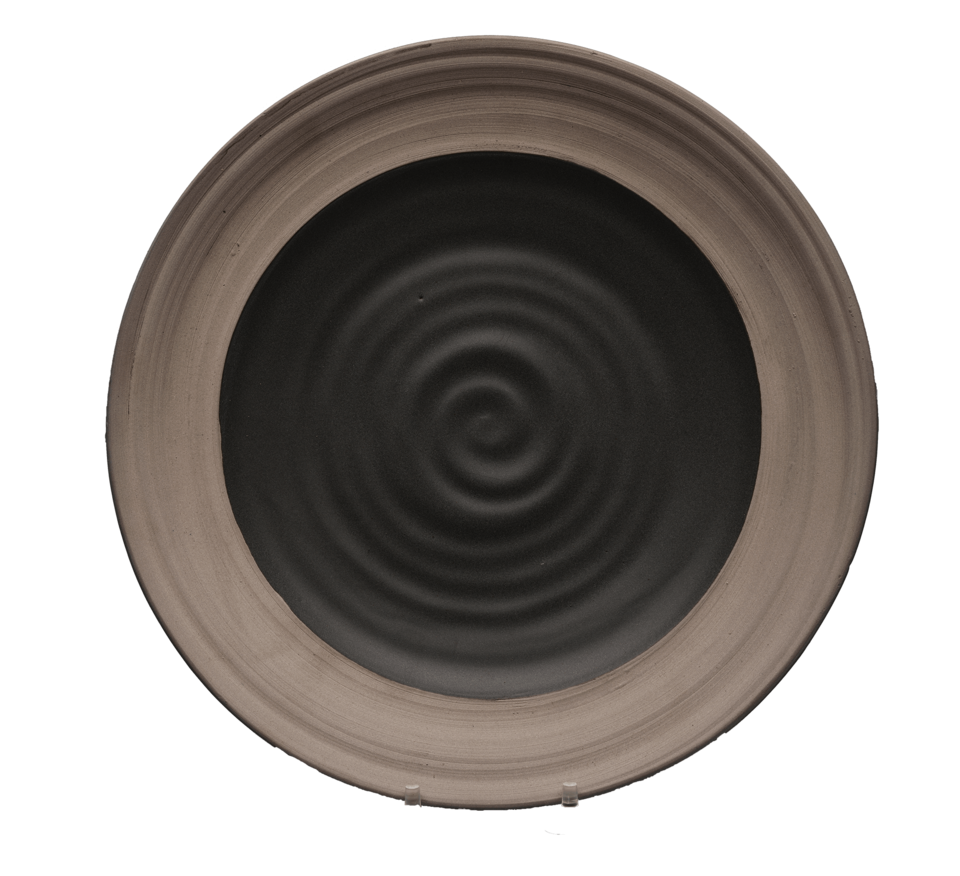 A circular plate with a spiraling dark grey center and a wide light gray rim.