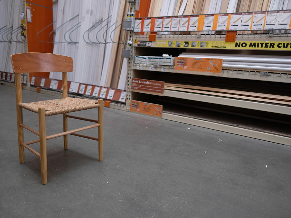 Image of Big Box Vernacular, an iteration of the J39 chair made entirely from tools and materials available at a home improvement center, in the moulding aisle of the Home Depot.