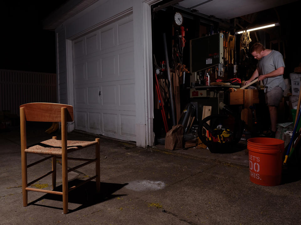 Image of Big Box Vernacular, an iteration of the J39 chair made entirely from tools and materials available at a home improvement center, in front of my garage, while I size tenons for another chair.