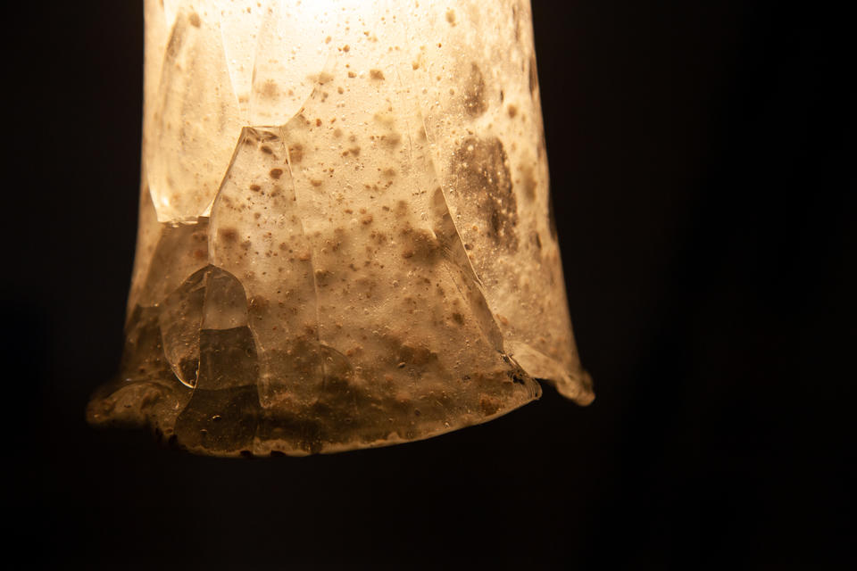 light moving through glass made from beach sand