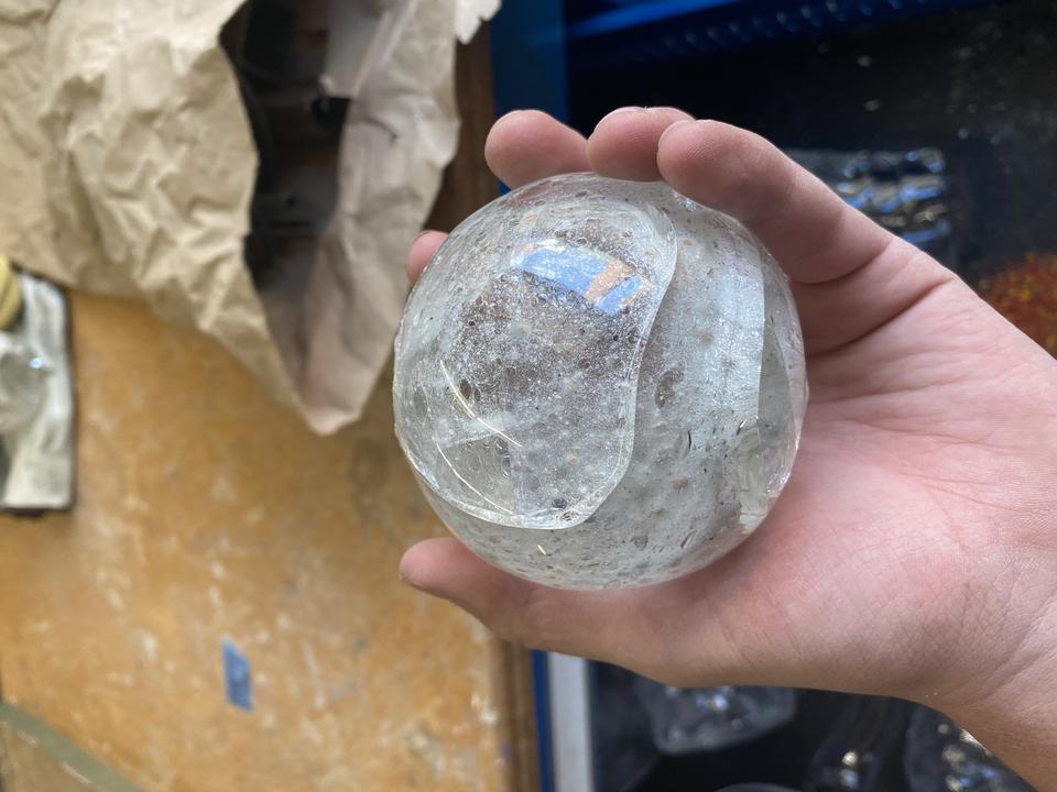 Glass sphere made form beach sand glass