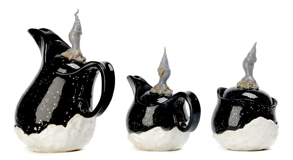 Set of 2 pitchers and a jar based on winter. Top is a gloss black with luster stars and the bottom is a satin white. 