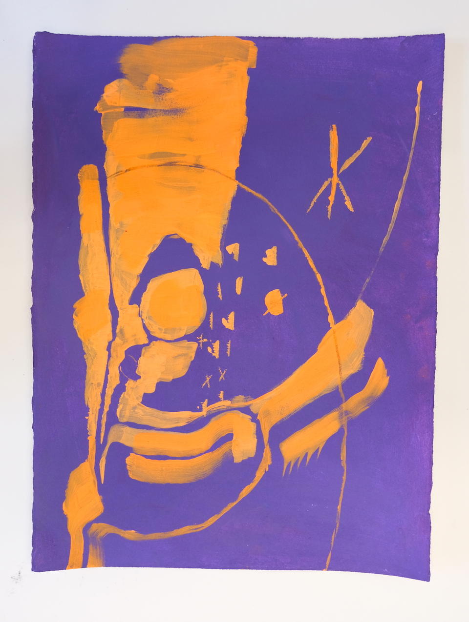 Photo of an orange and purple abstract drawing