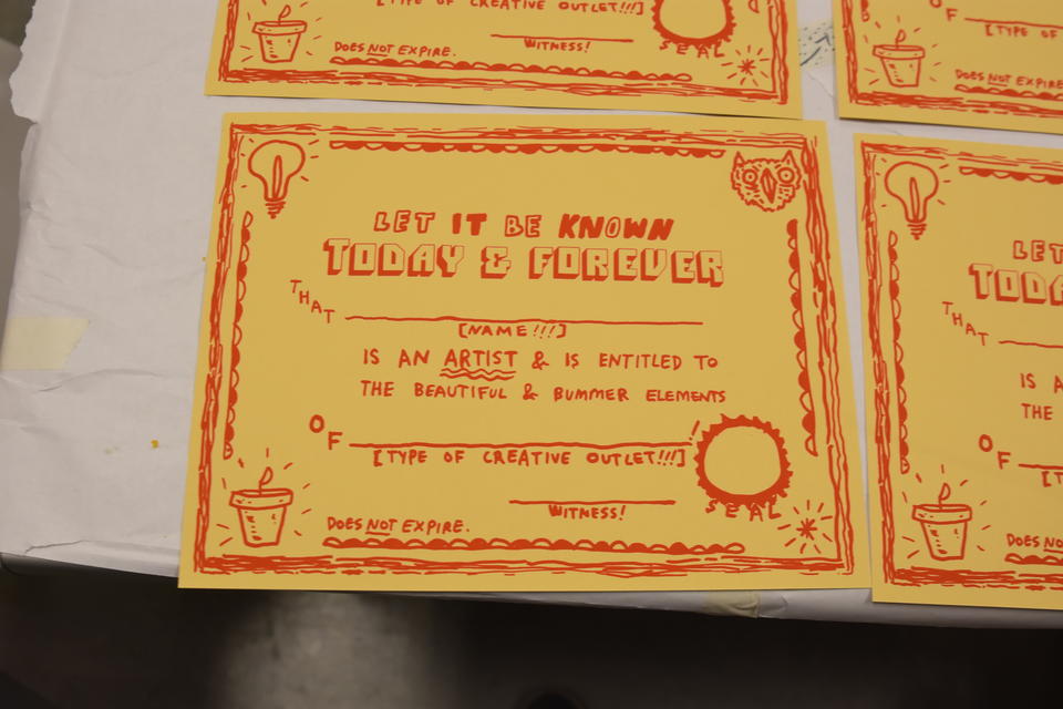 screenprinted hand-drawn certificates that say 'Let it be known today and forever that [name!!!] is an artist and is entitled to the beautiful and bummer elements of [type of creative outlet!!!]!'