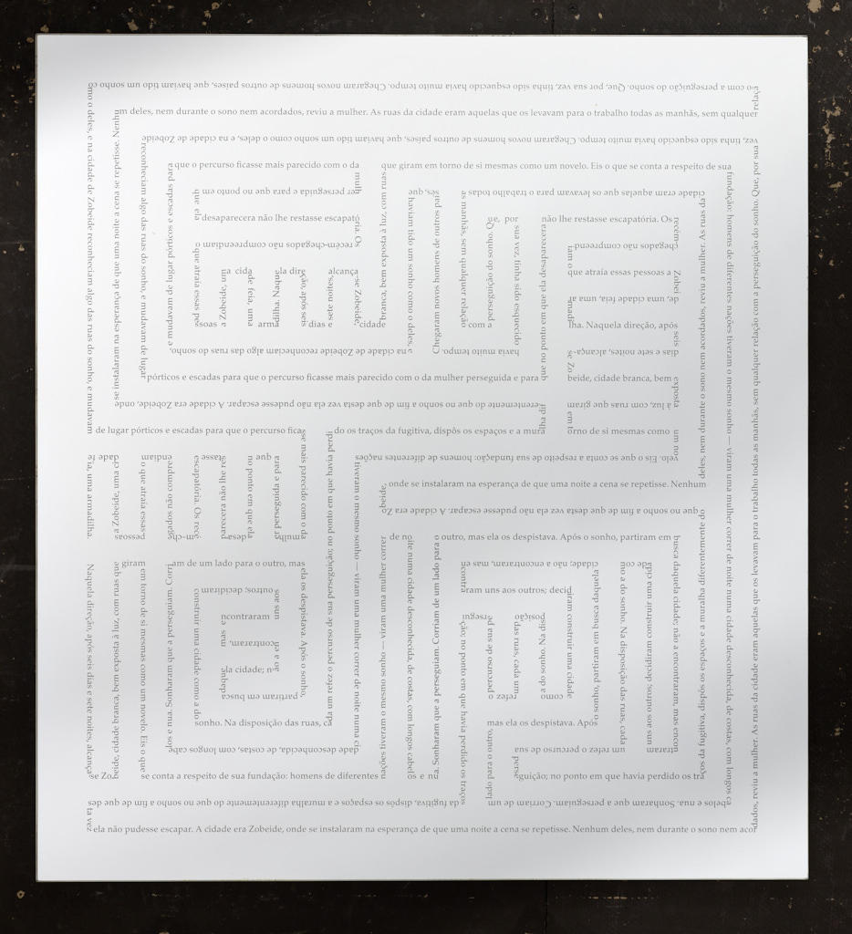 Perfectly even maze-like geometric design on white. The design looks gray, but closer examination shows that it’s actually text.