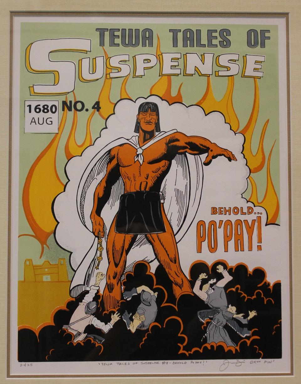 Jason Garcia's work Behold, Po'pay! is a serigraph print designed to look like a comic book cover featuring the protagonist, Po'pay, with a white cape towering over several Spanish soldiers and monks surrounded by a cloud of black smoke. Just behind Po'pay a billowing cloud of white smoke and orange flames outline his body in front of a pastel green background.