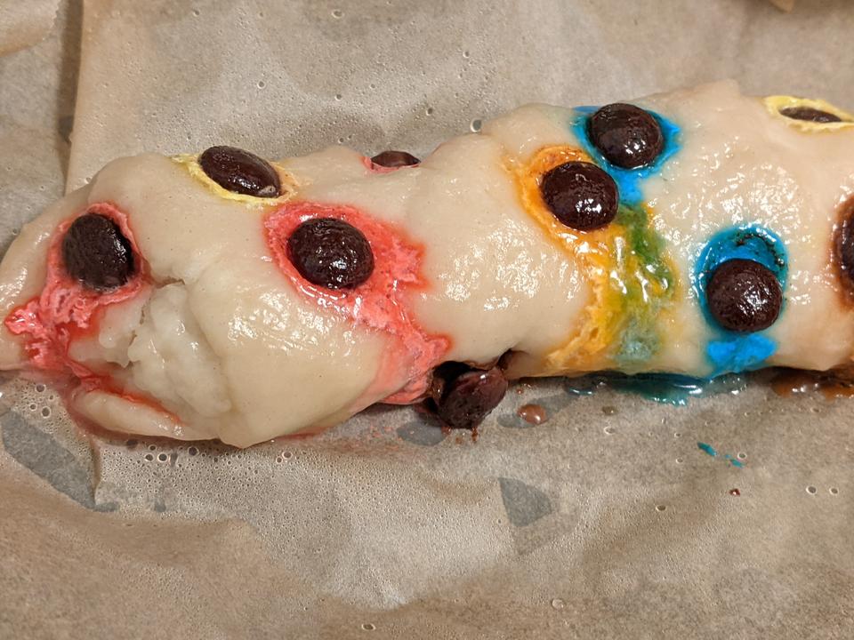 Colorful melted candies on top of steamed flour dough