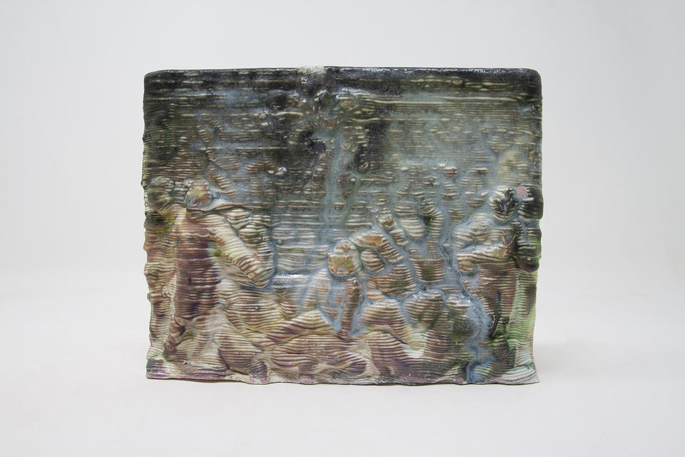 Blue and pink glazed ceramic tile scene showing crowd of people looking towards figure in the sky